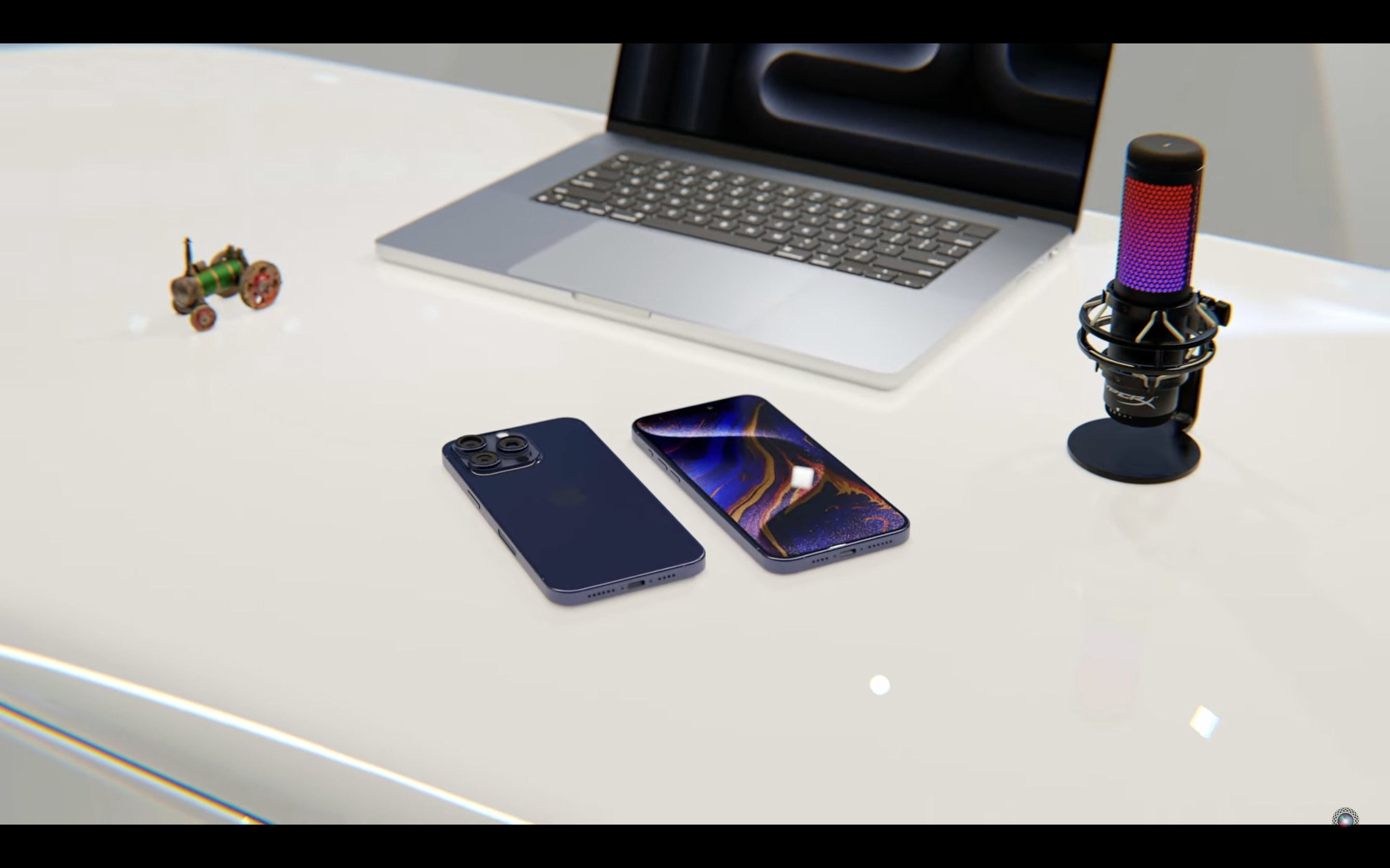 desk setup with smartphone and laptop