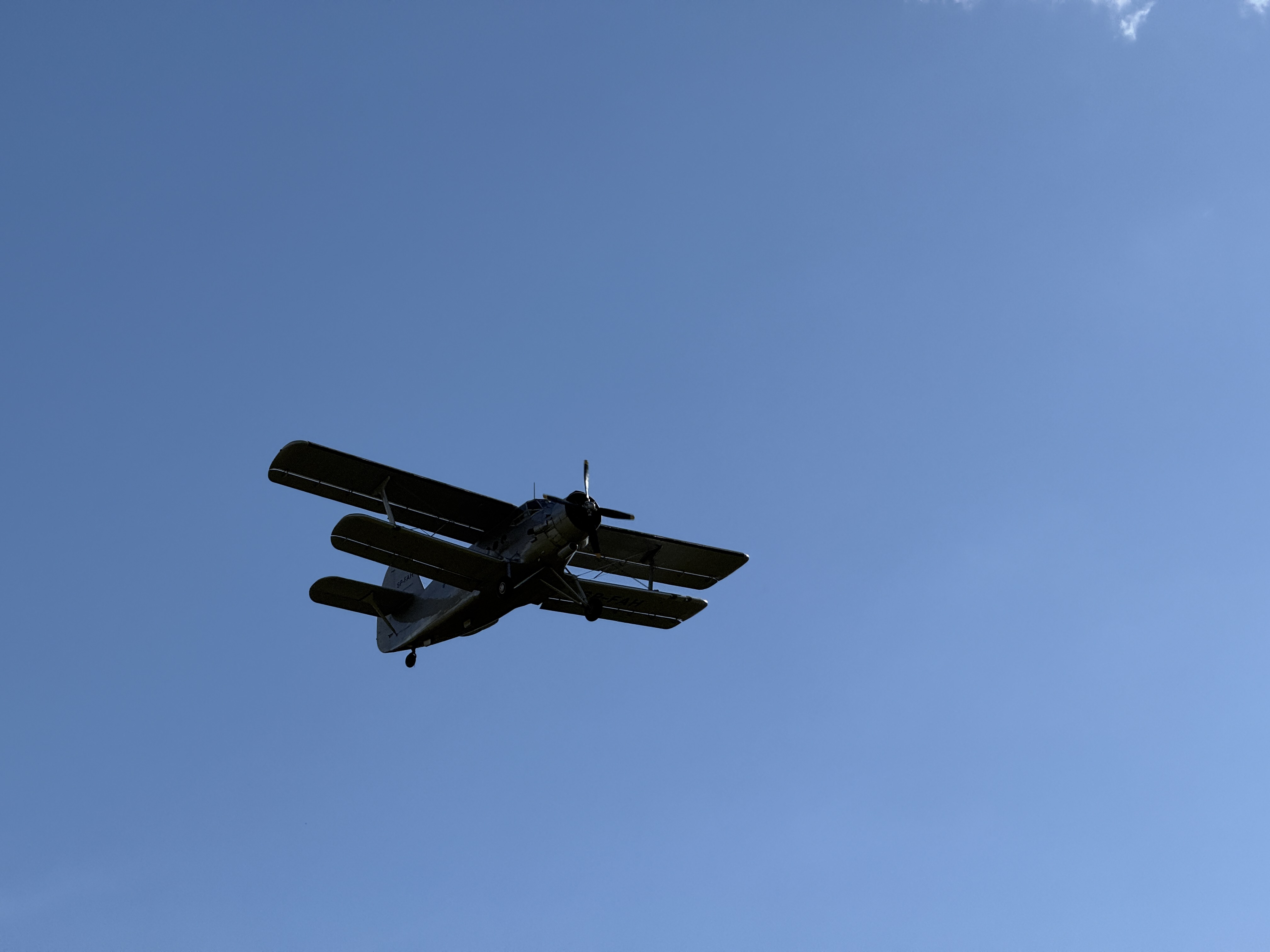airplane silhouette blue sky