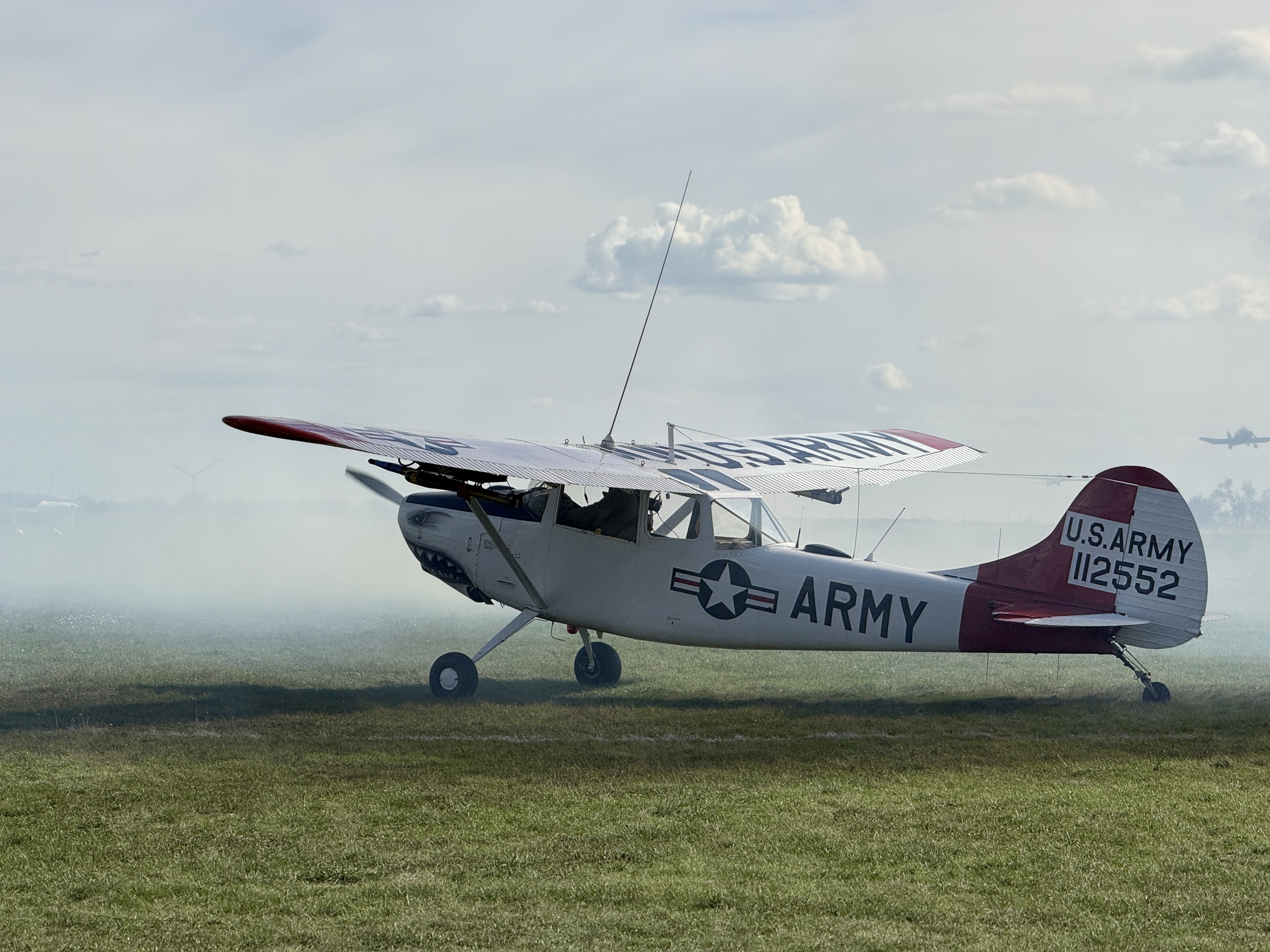 army airplane ground smoke