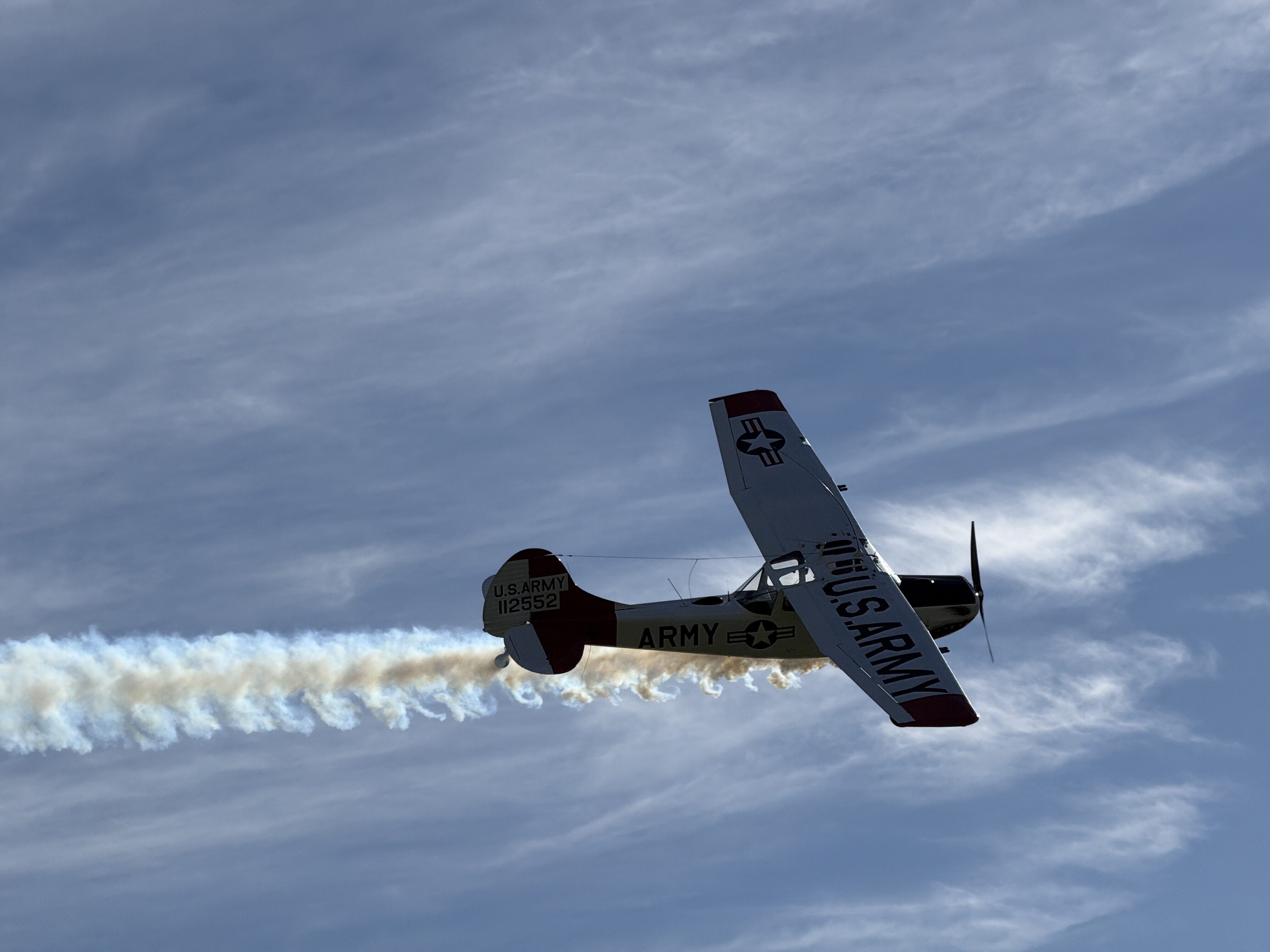 army airplane smoke trail
