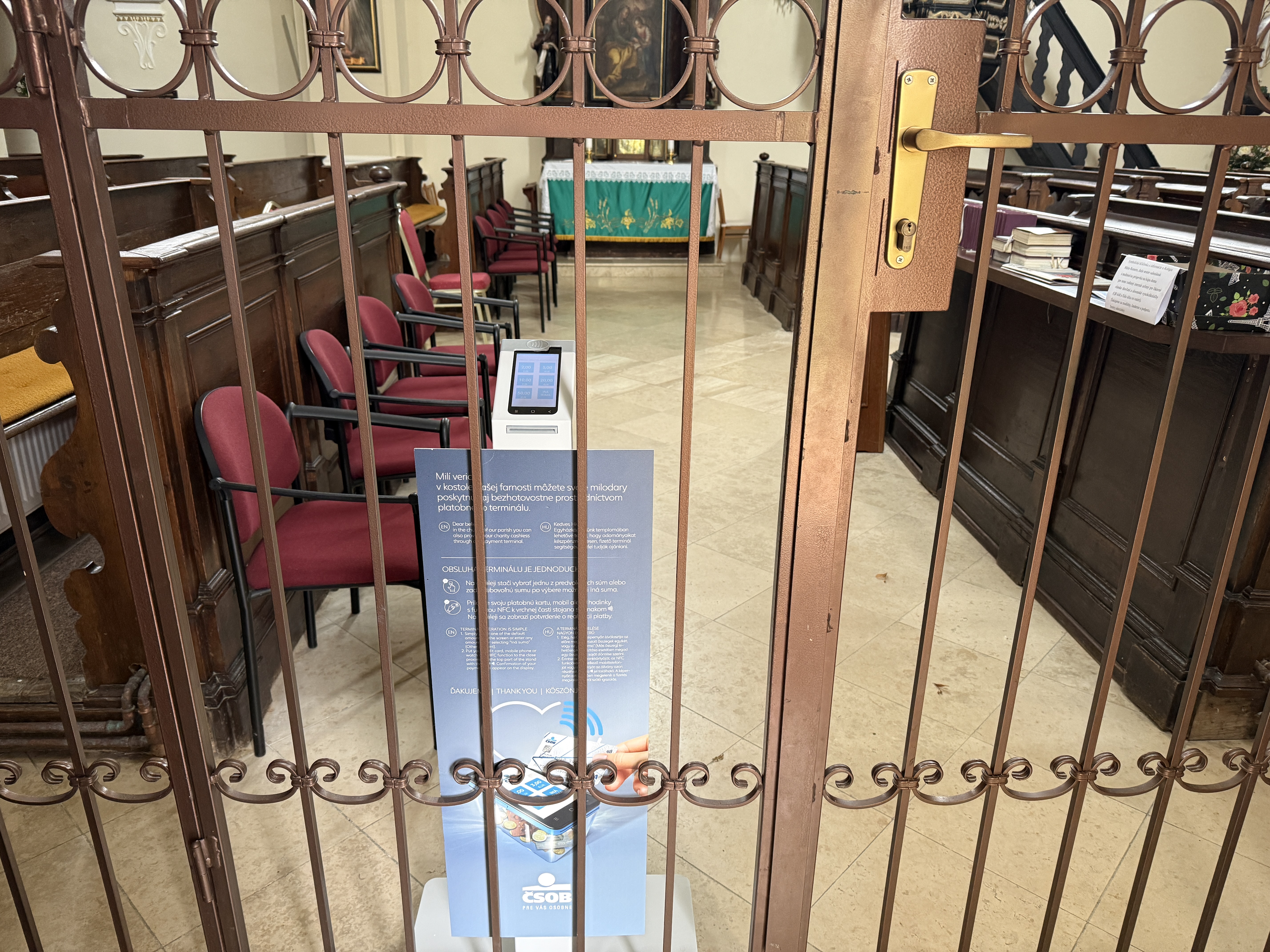 church interior with payment terminal