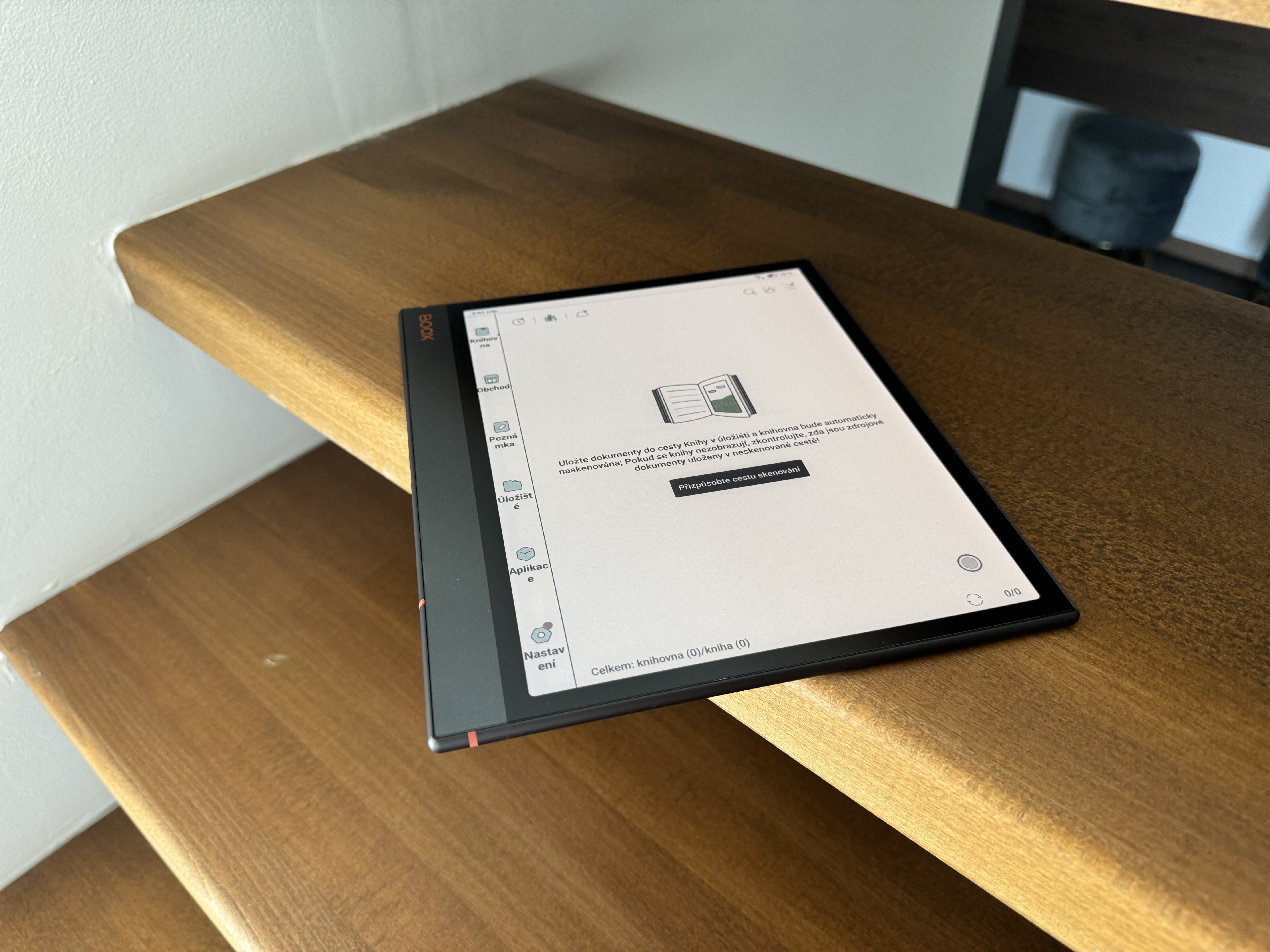ebook reader on wooden stairs