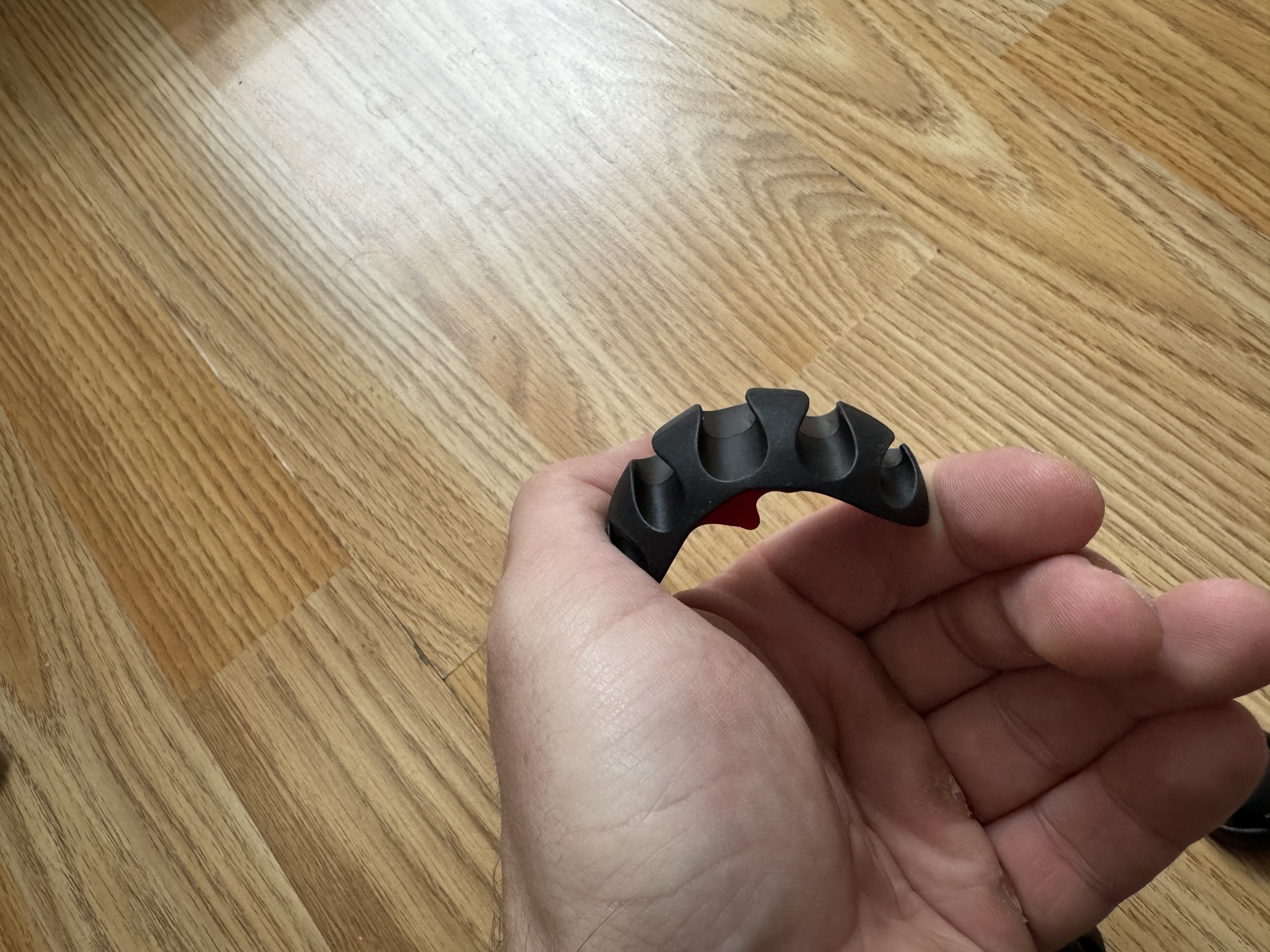 hand holding cable organizer