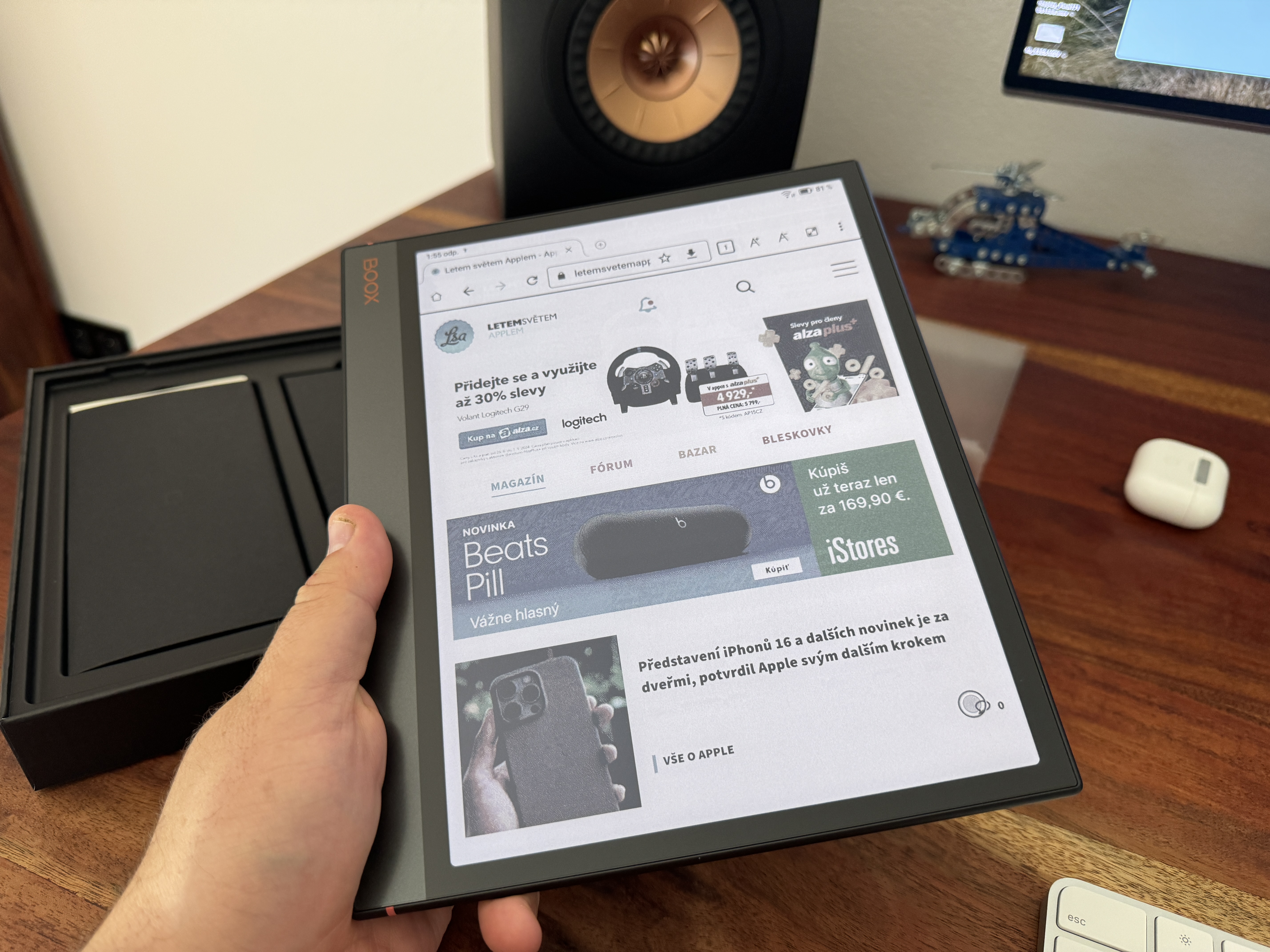 hand holding ebook reader browser