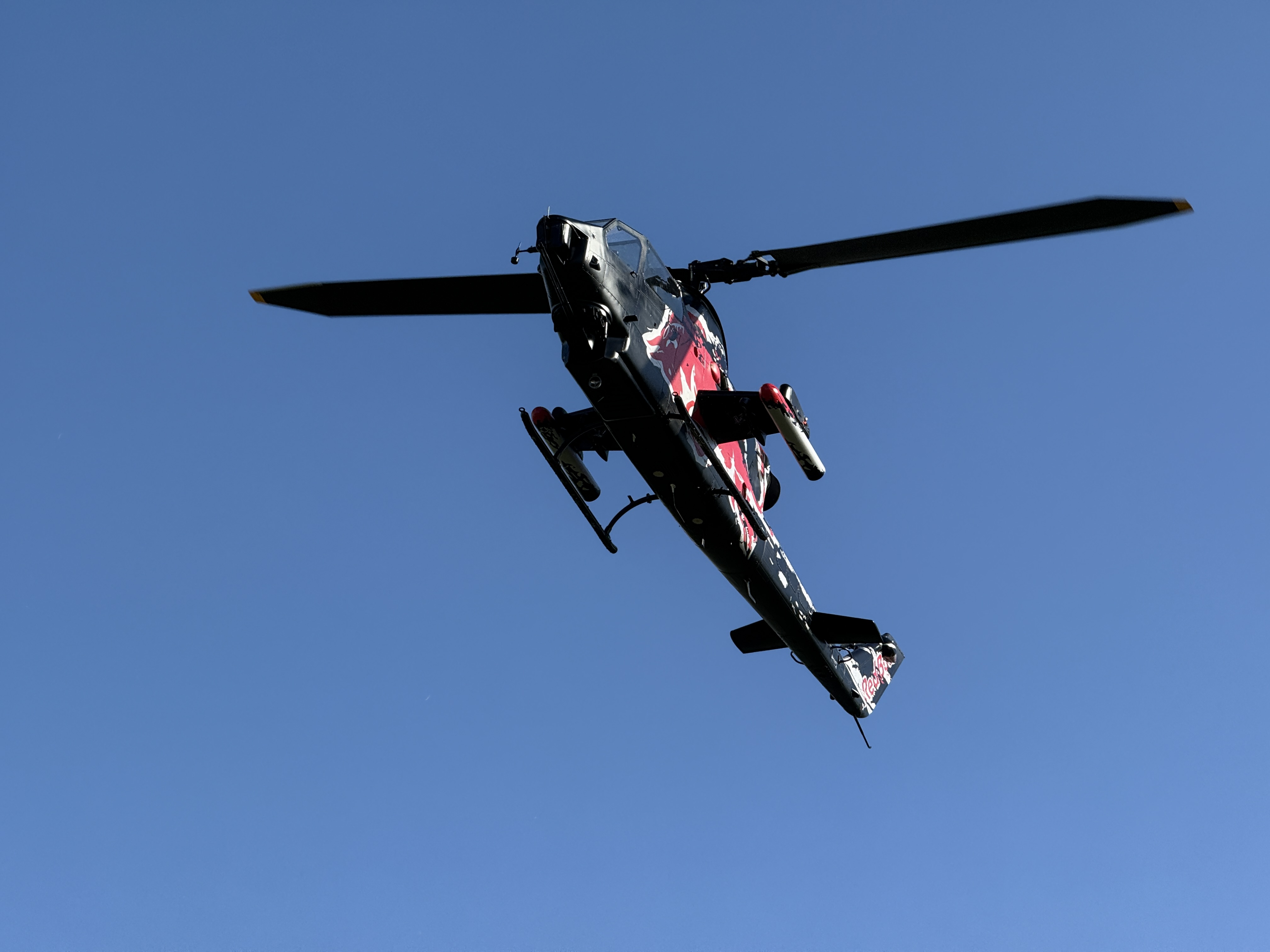 helicopter silhouette blue sky