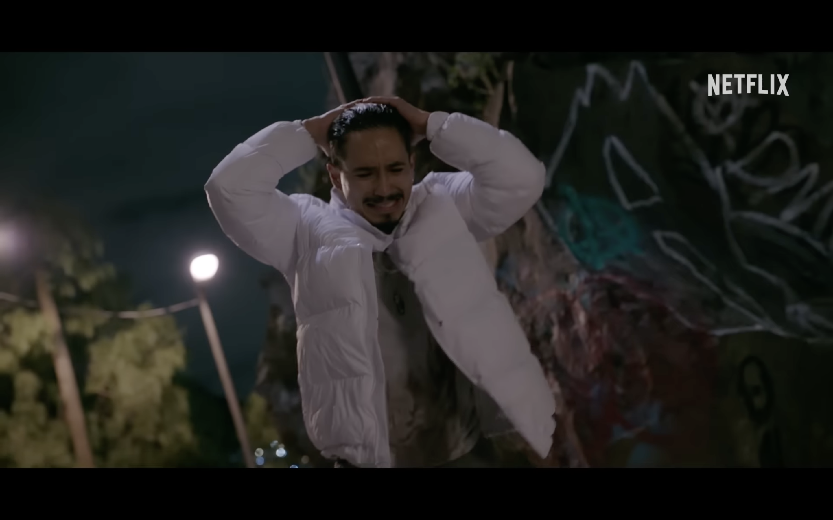 man in white jacket night scene man in white jacket night scene