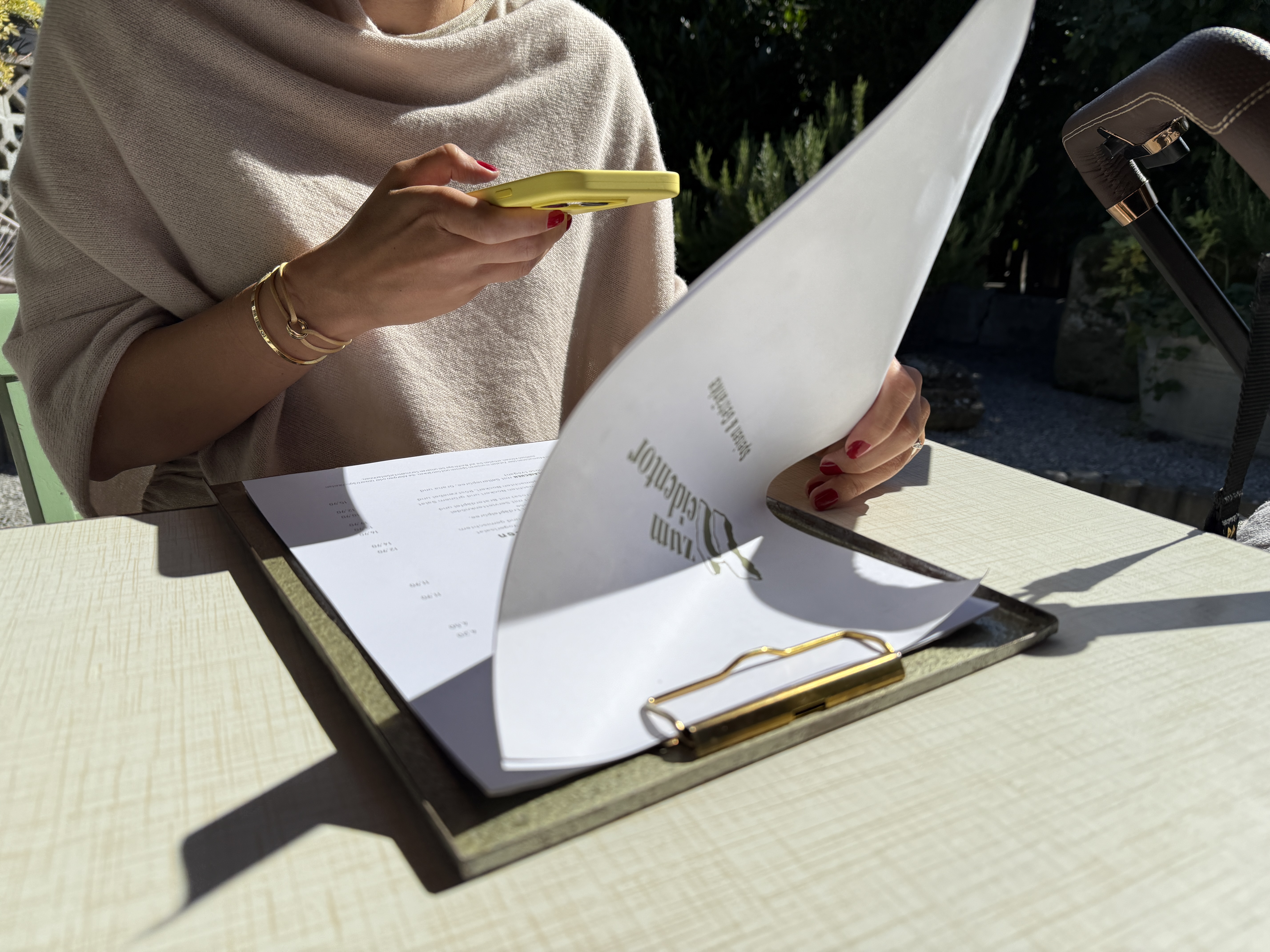 person reading menu outside