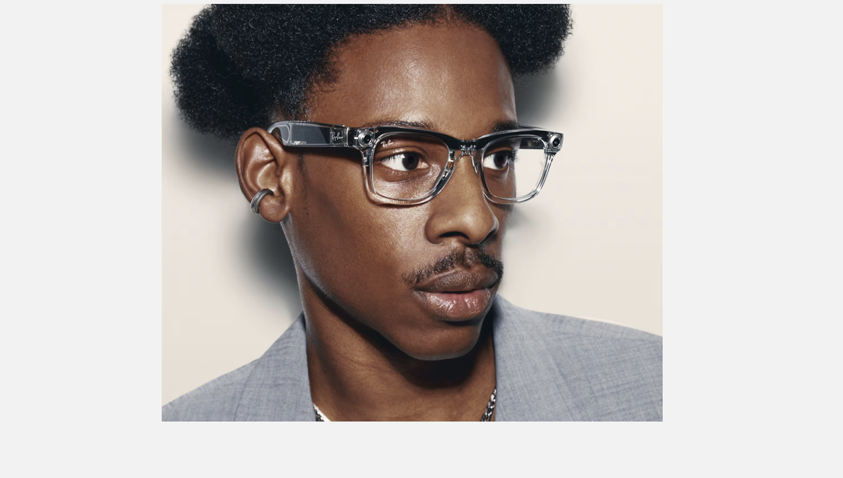 person wearing ray ban glasses