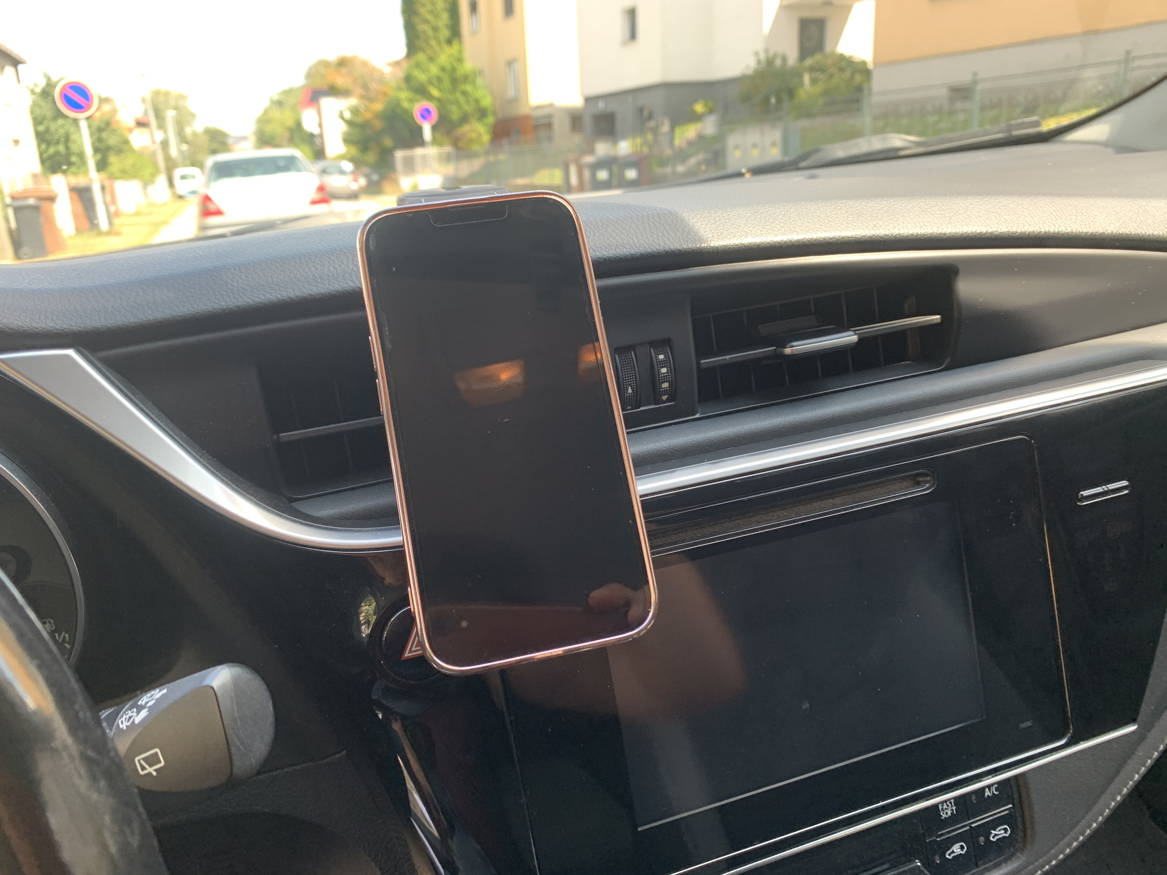 phone on dashboard in car