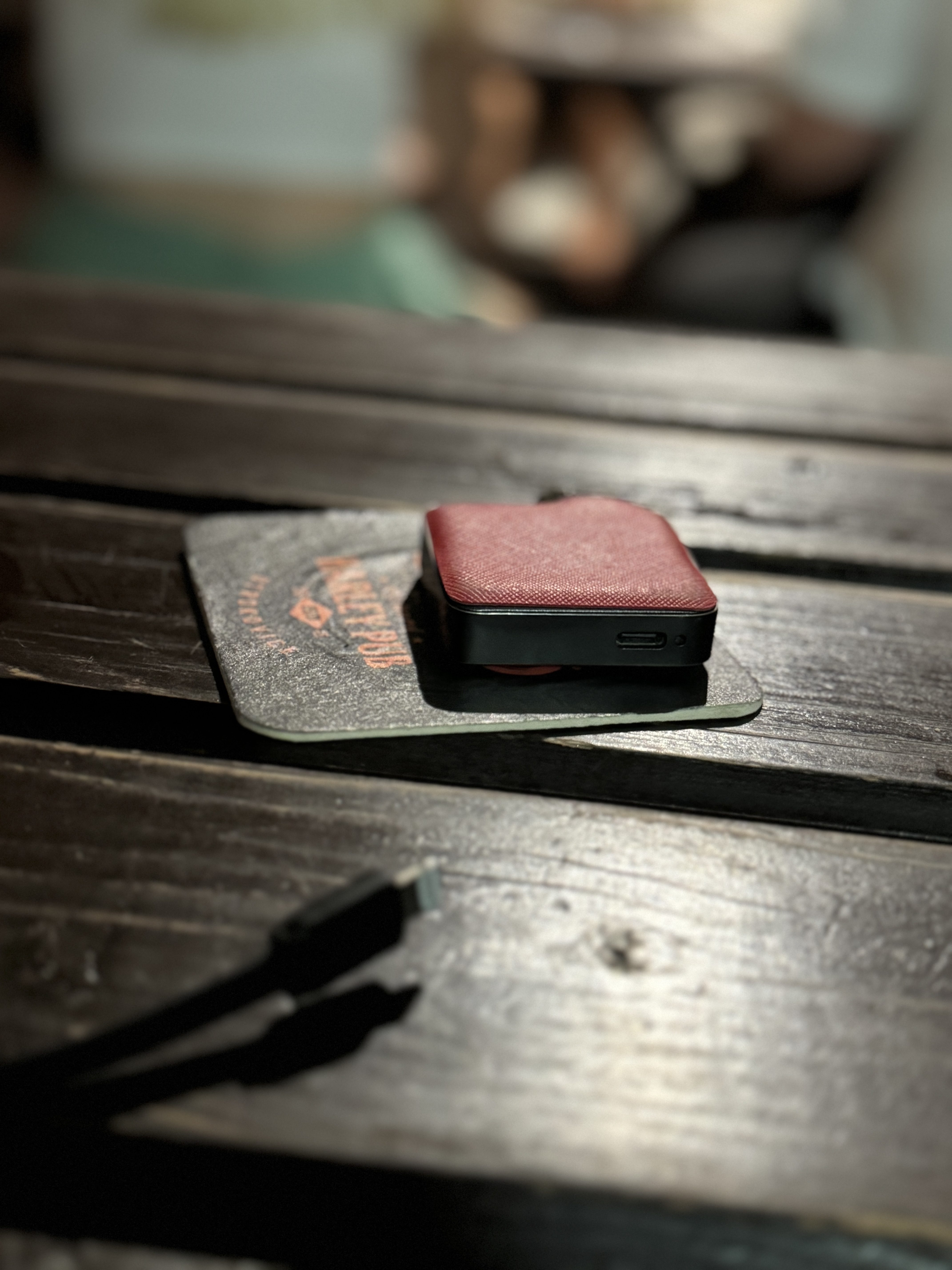 red leather case on table