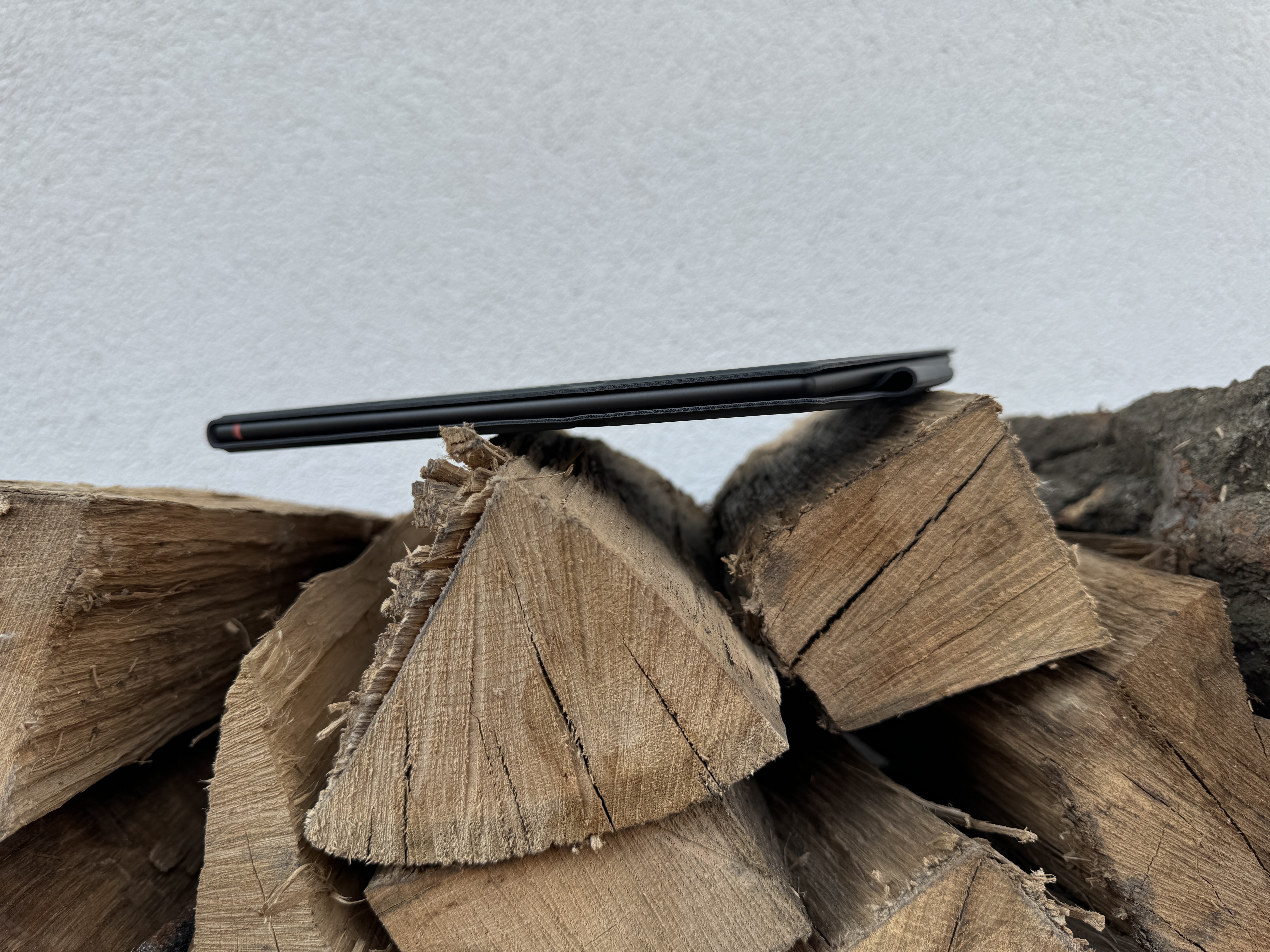 side view ebook reader on logs