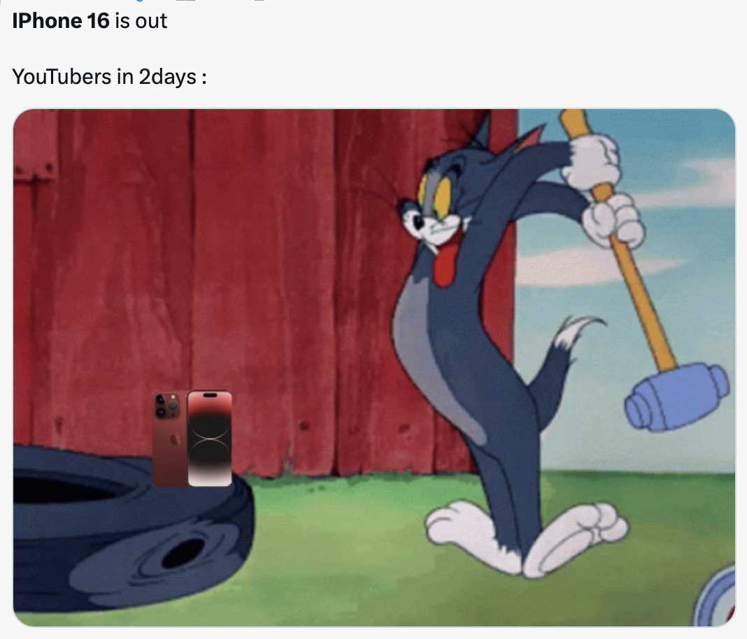 tom holding iphone cartoon