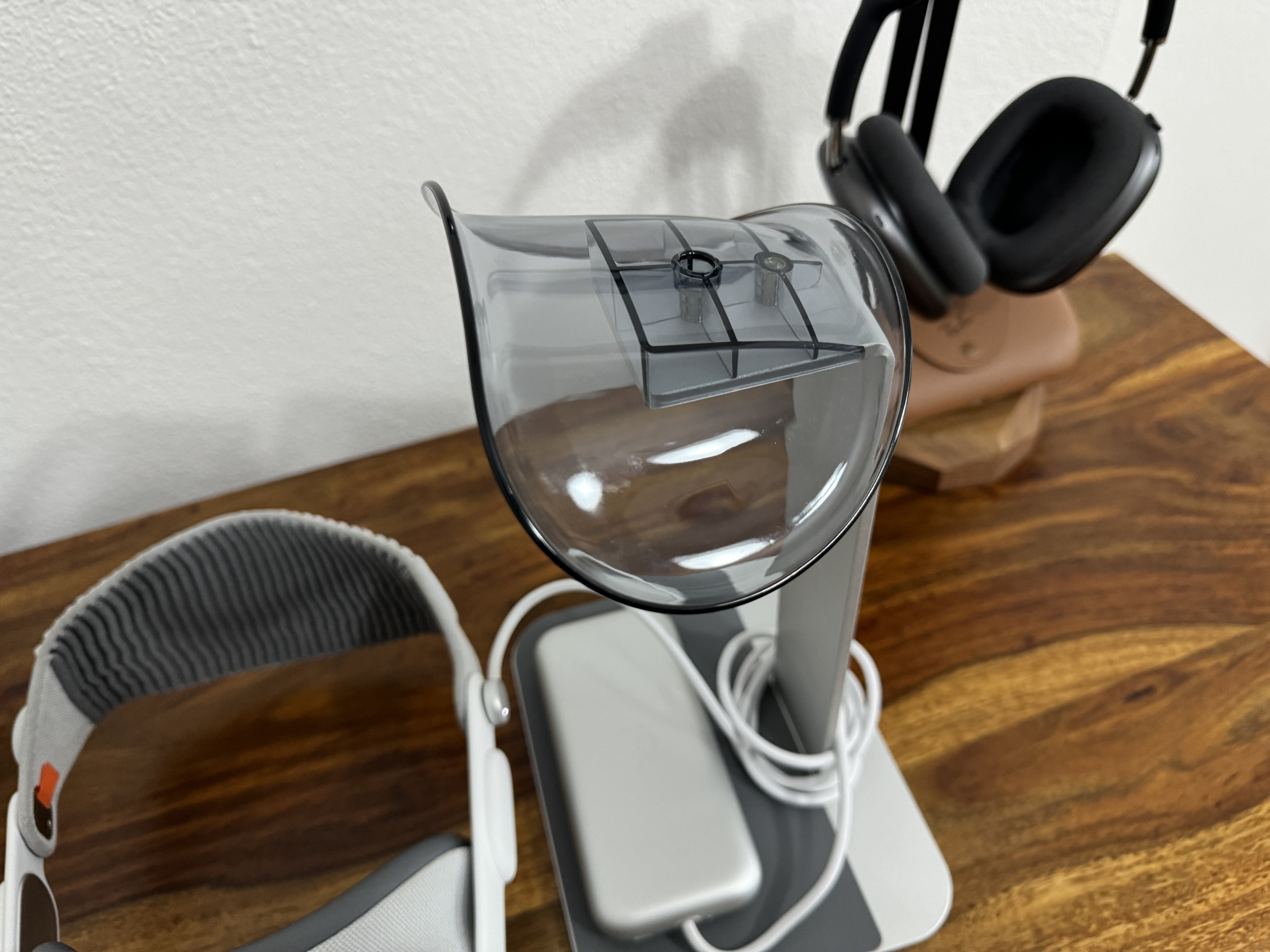 vr headset and headphones on stand