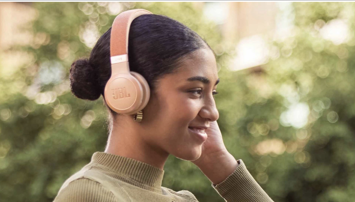 woman wearing headphones outdoors