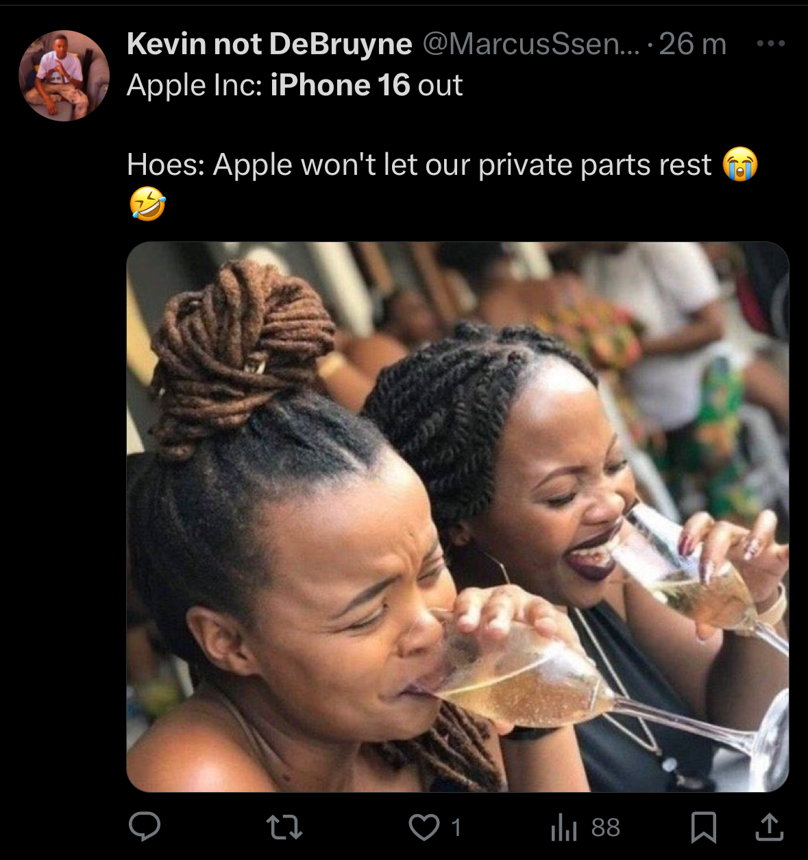 women laughing with drinks