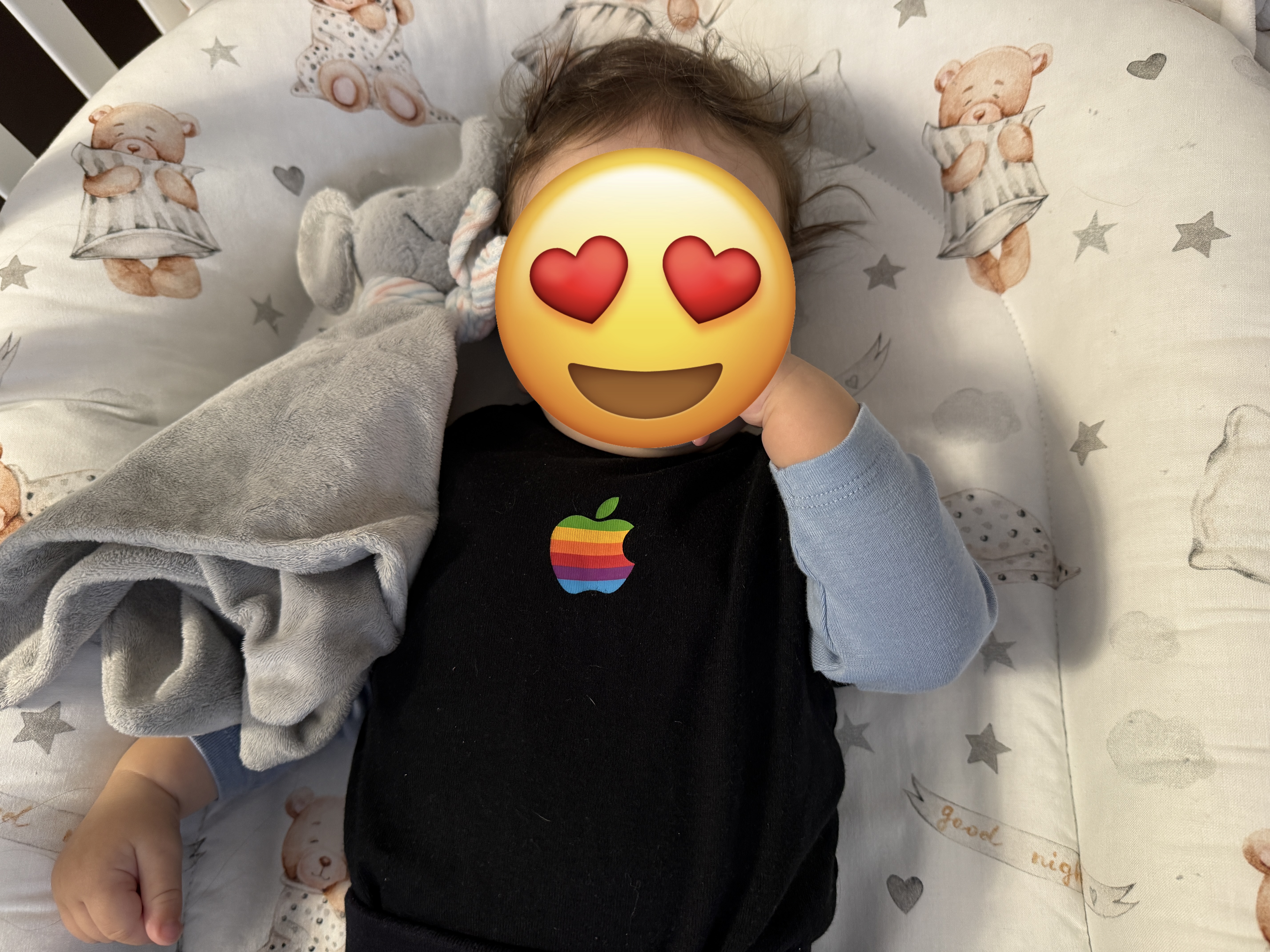 baby closeup with apple logo
