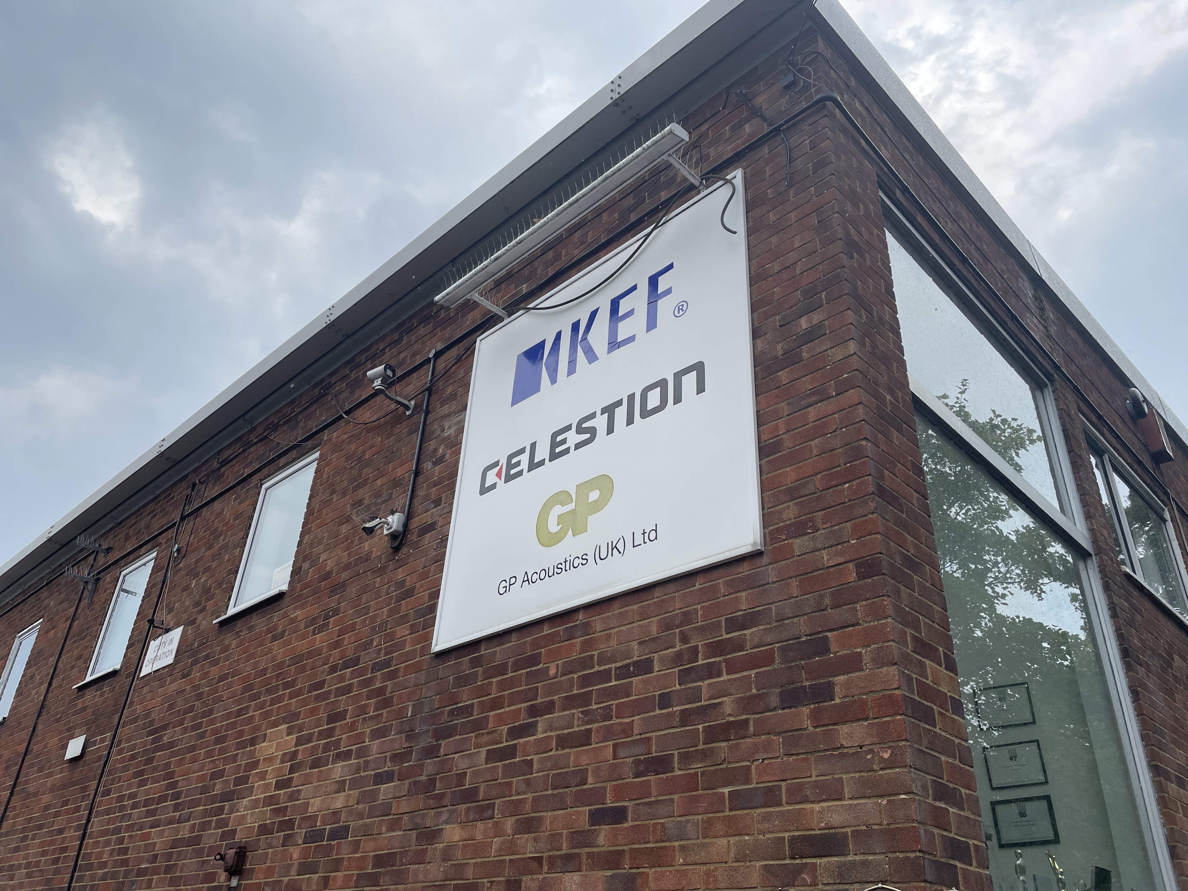 brick building kef celestion sign