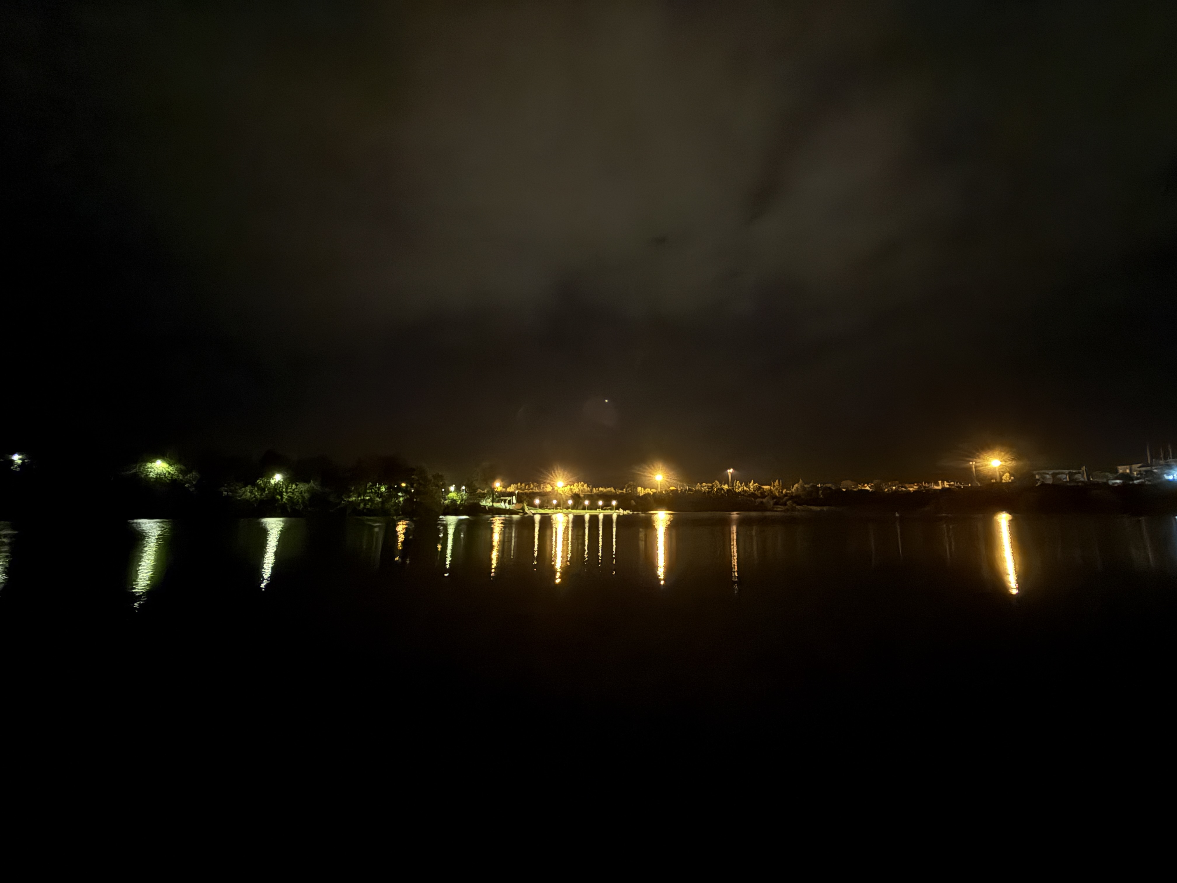 city lights reflection water