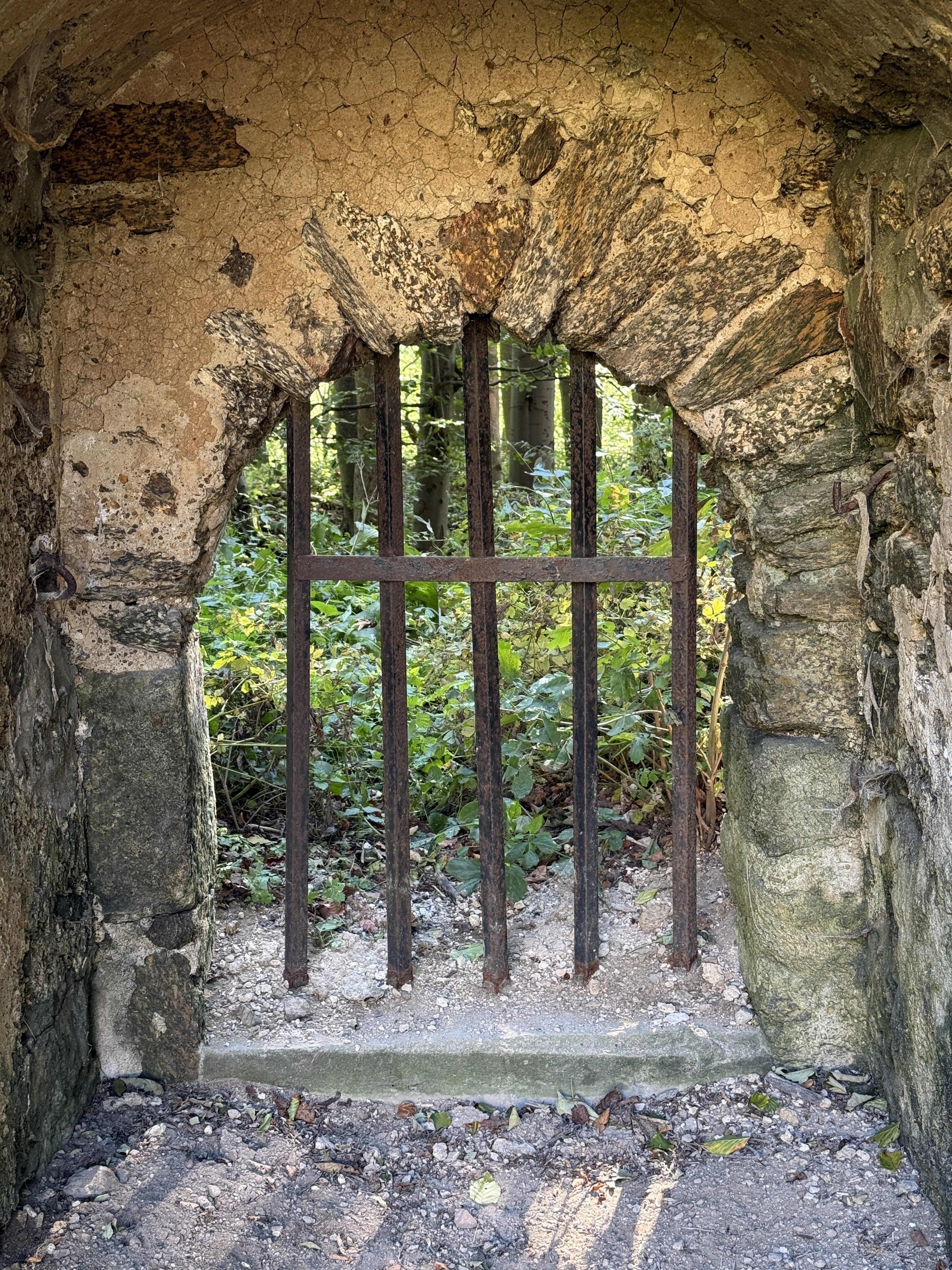 closeup stone archway bars
