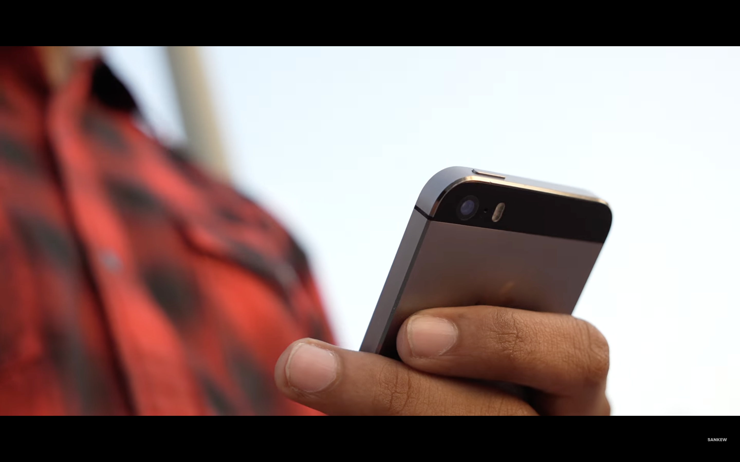 hand holding iphone closeup