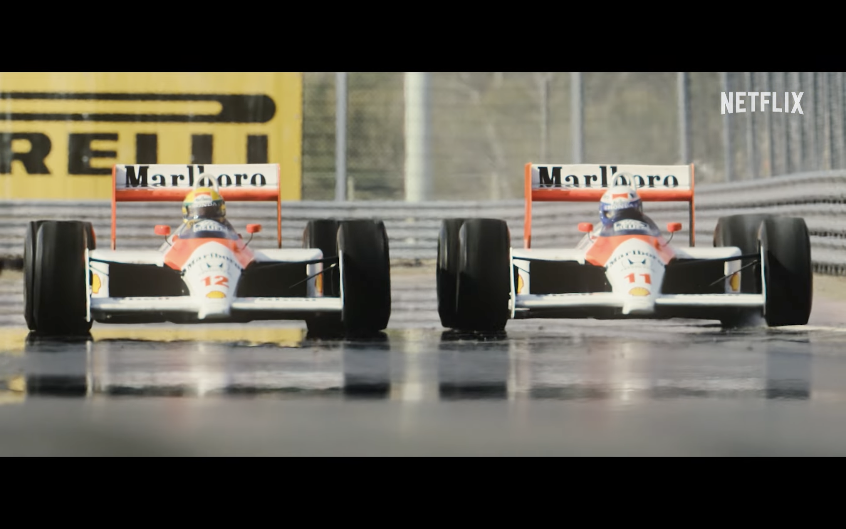 two race cars on track