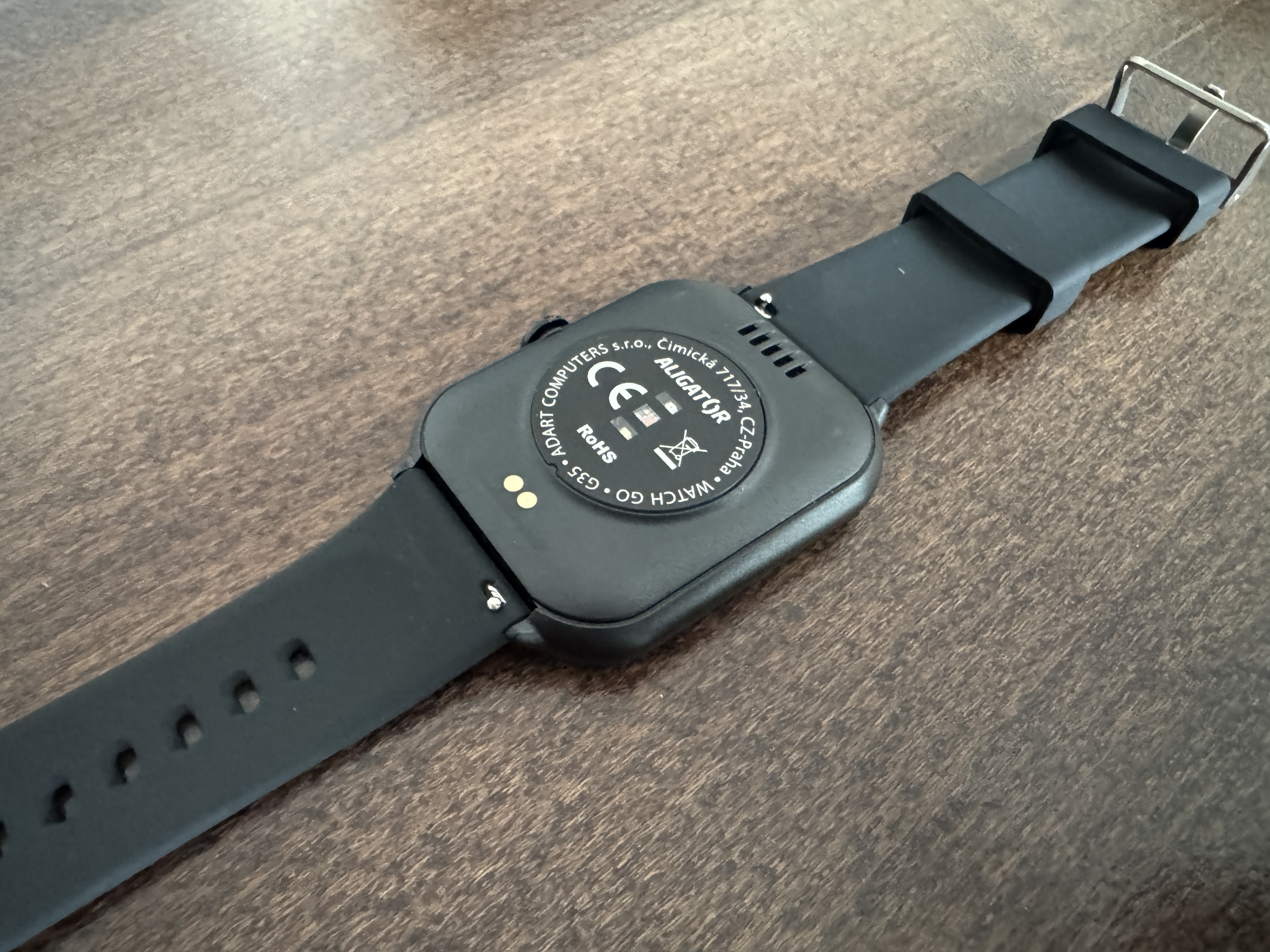 back of smartwatch on table