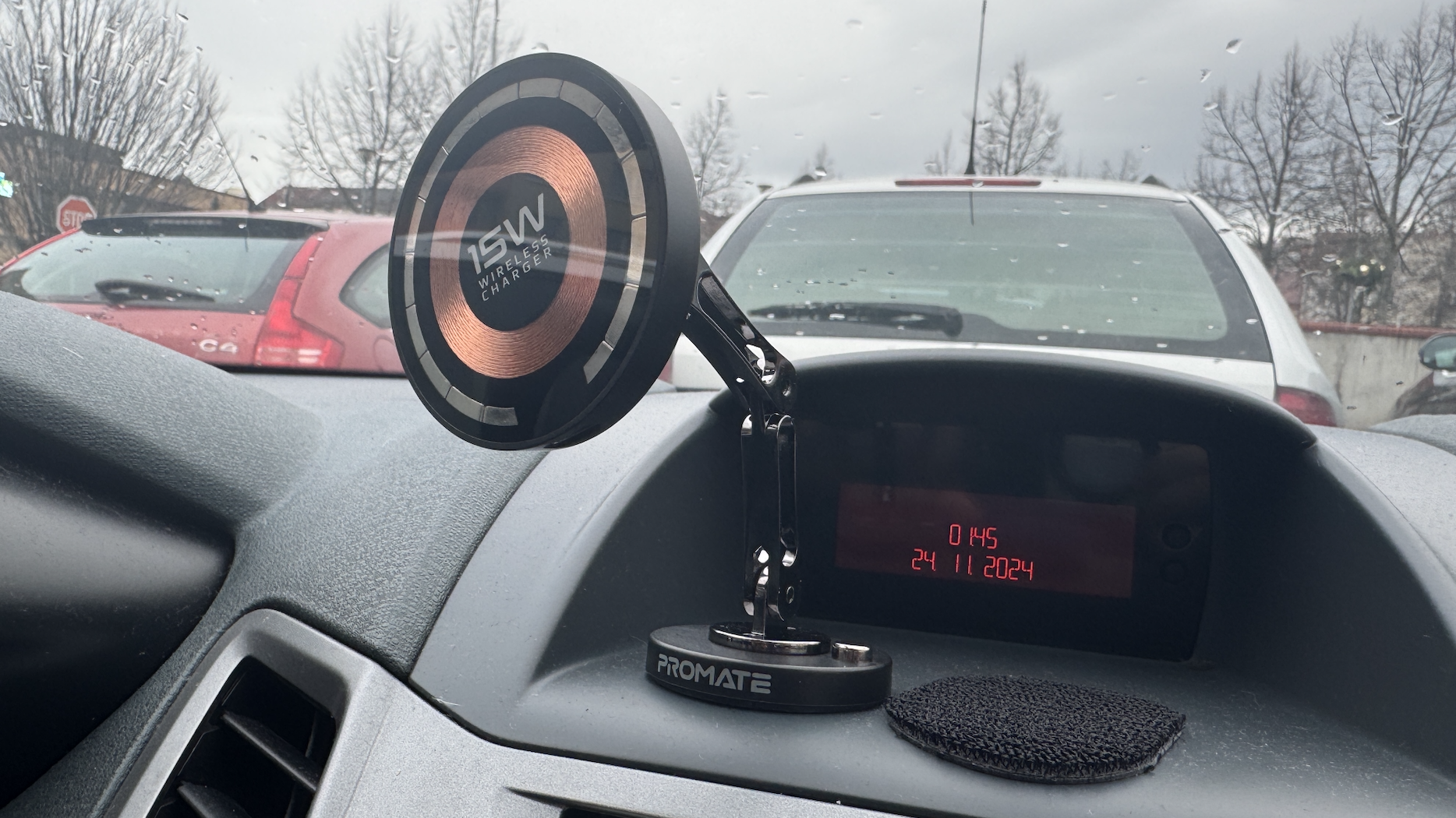 car dashboard wireless charger windshield view