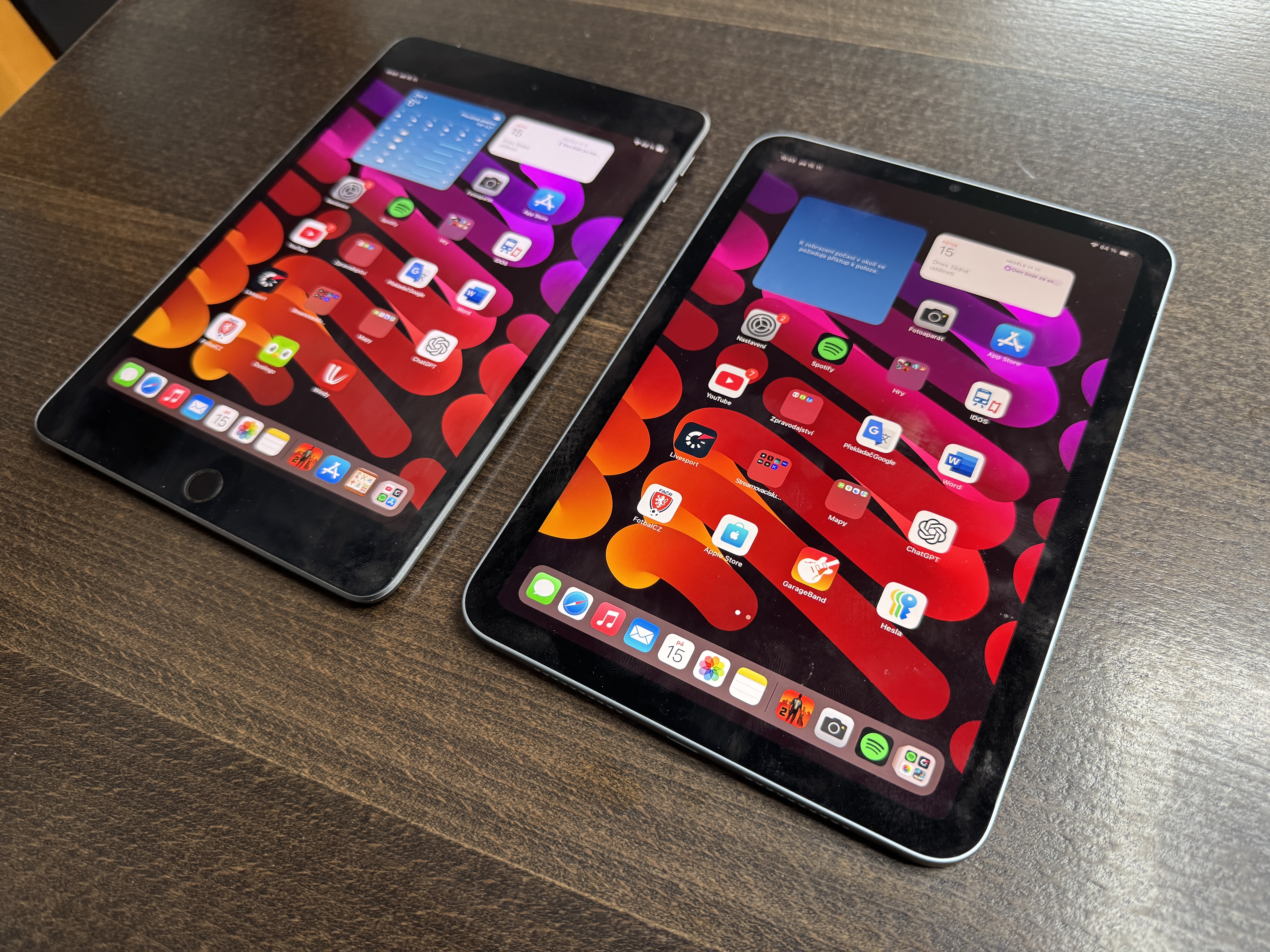 dual ipads on wooden table