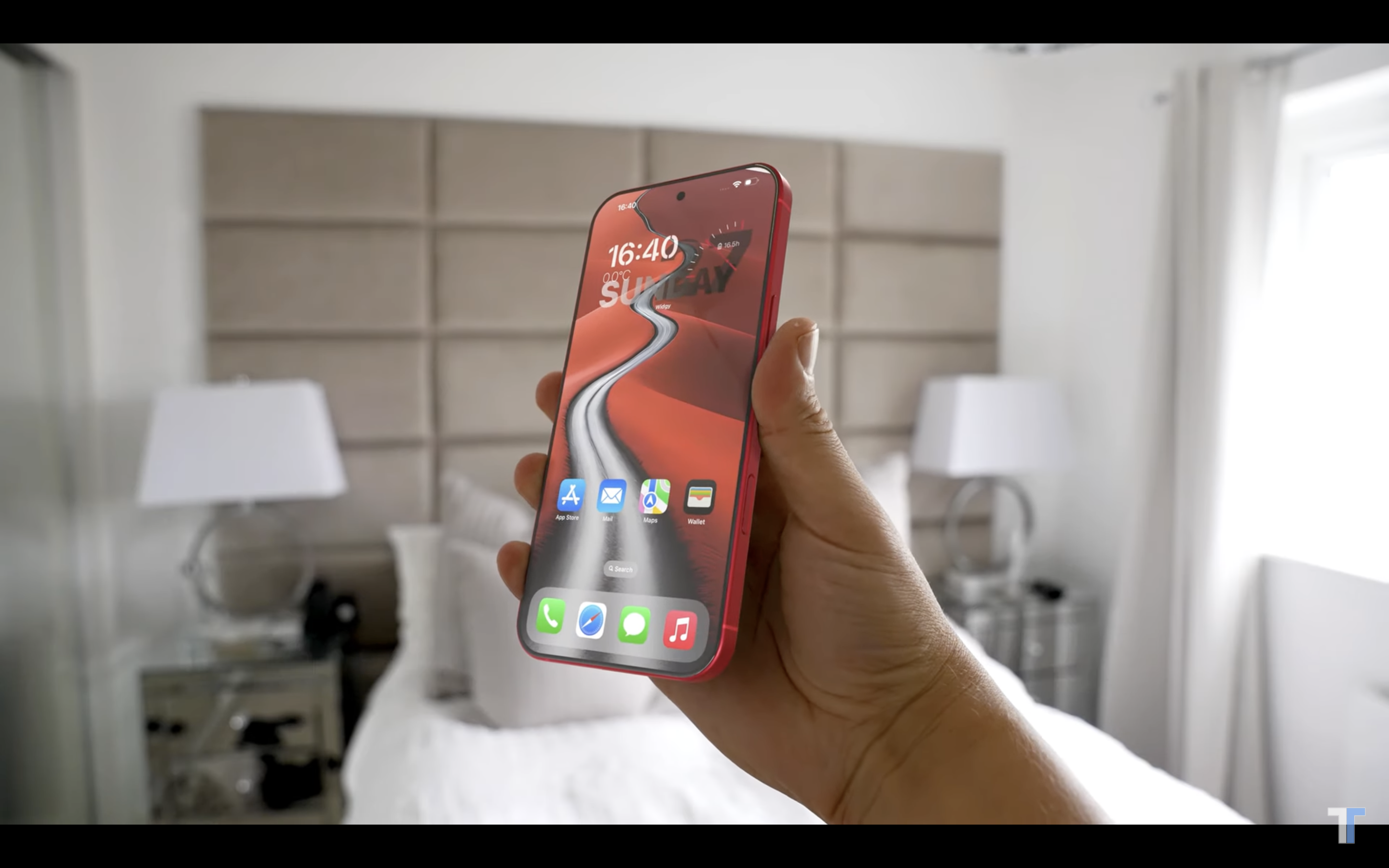 hand holding smartphone bedroom