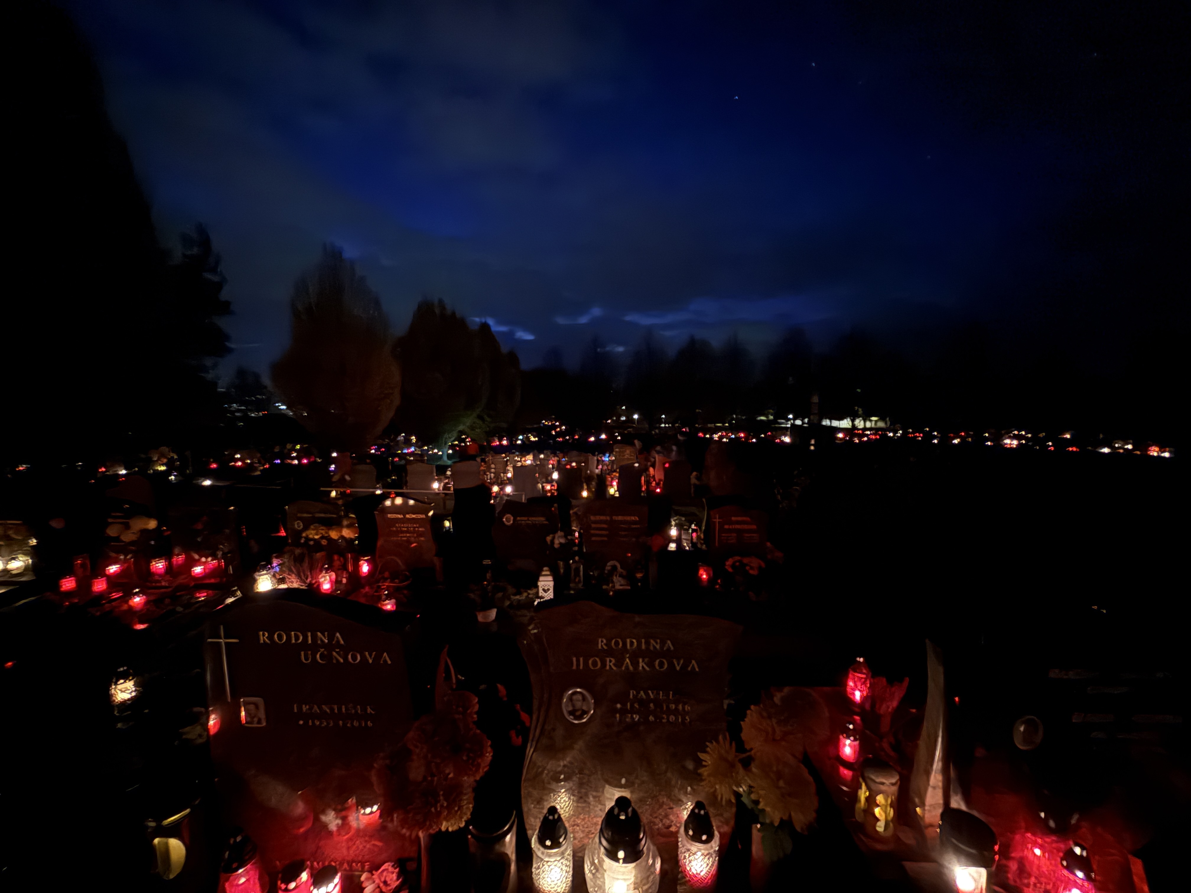 nighttime cemetery candles