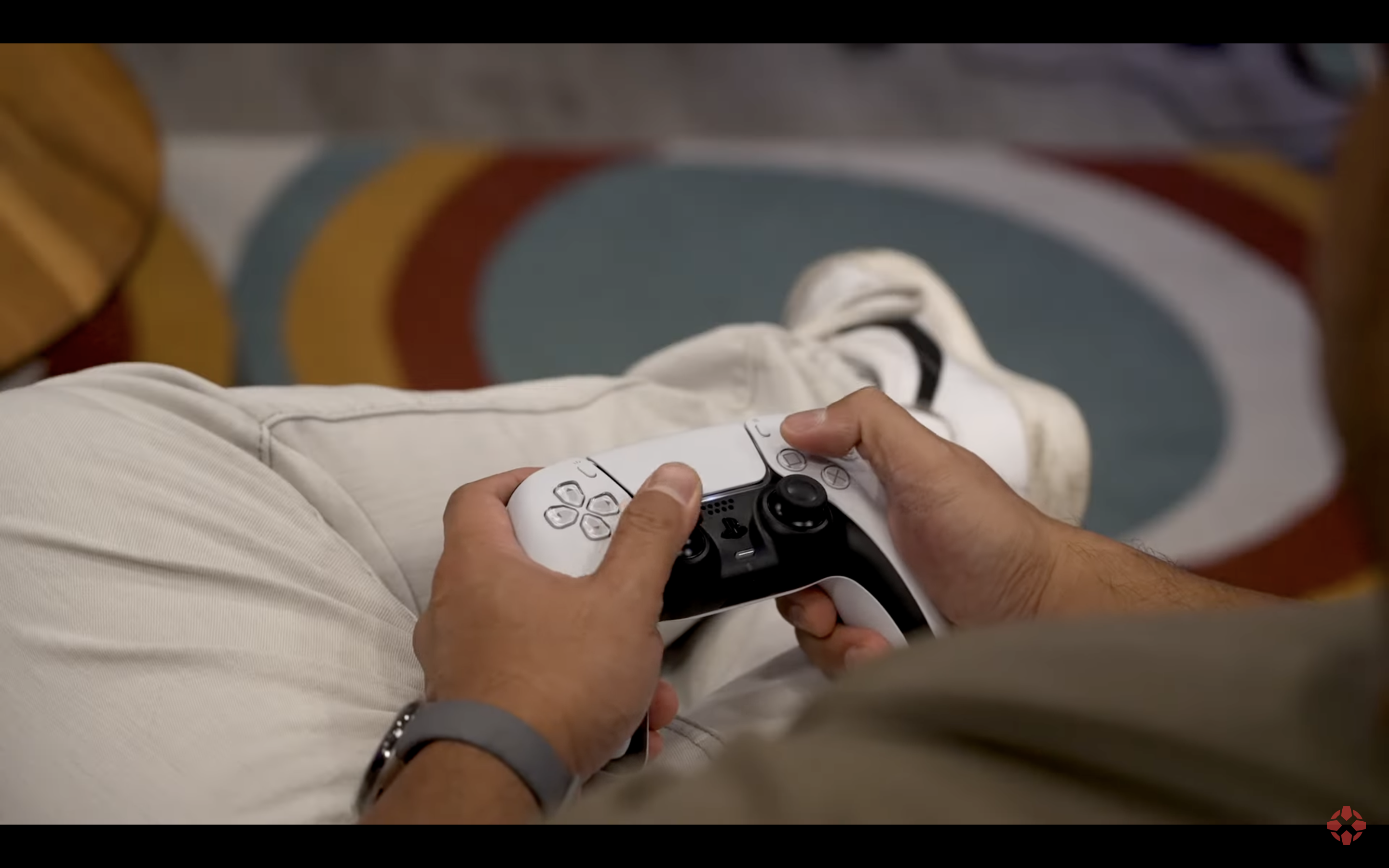 person holding ps5 controller