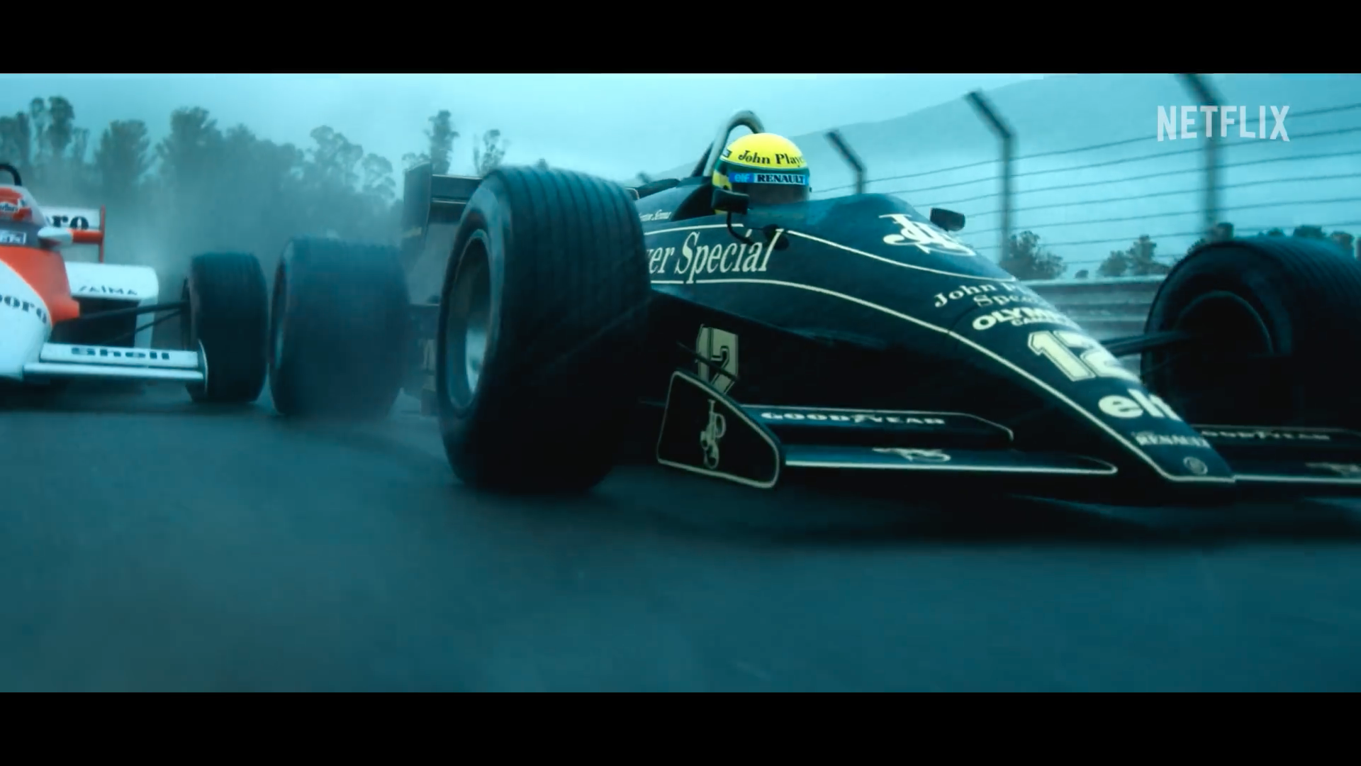 close up of racing cars on track close up of racing cars on track