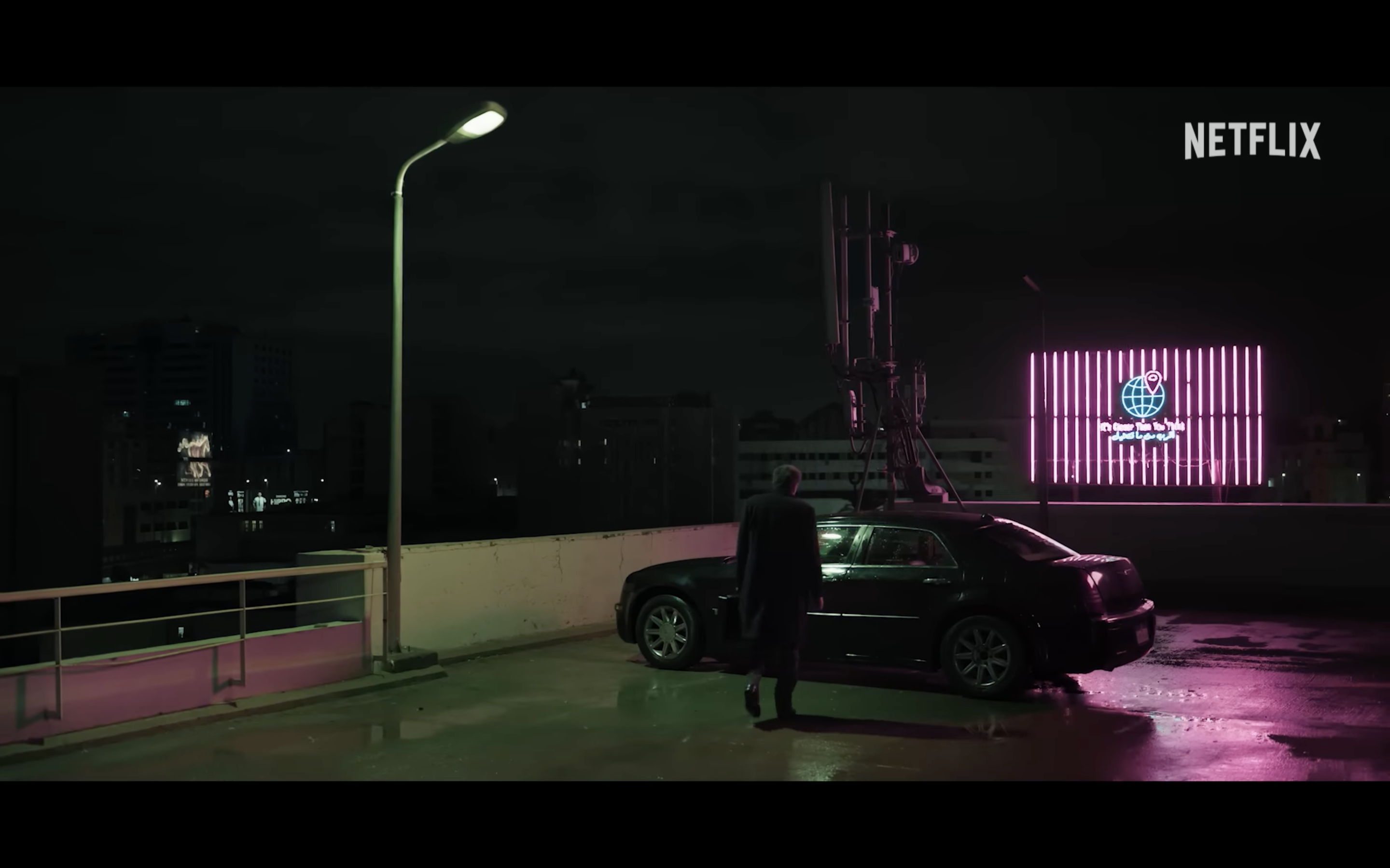 night rooftop car scene