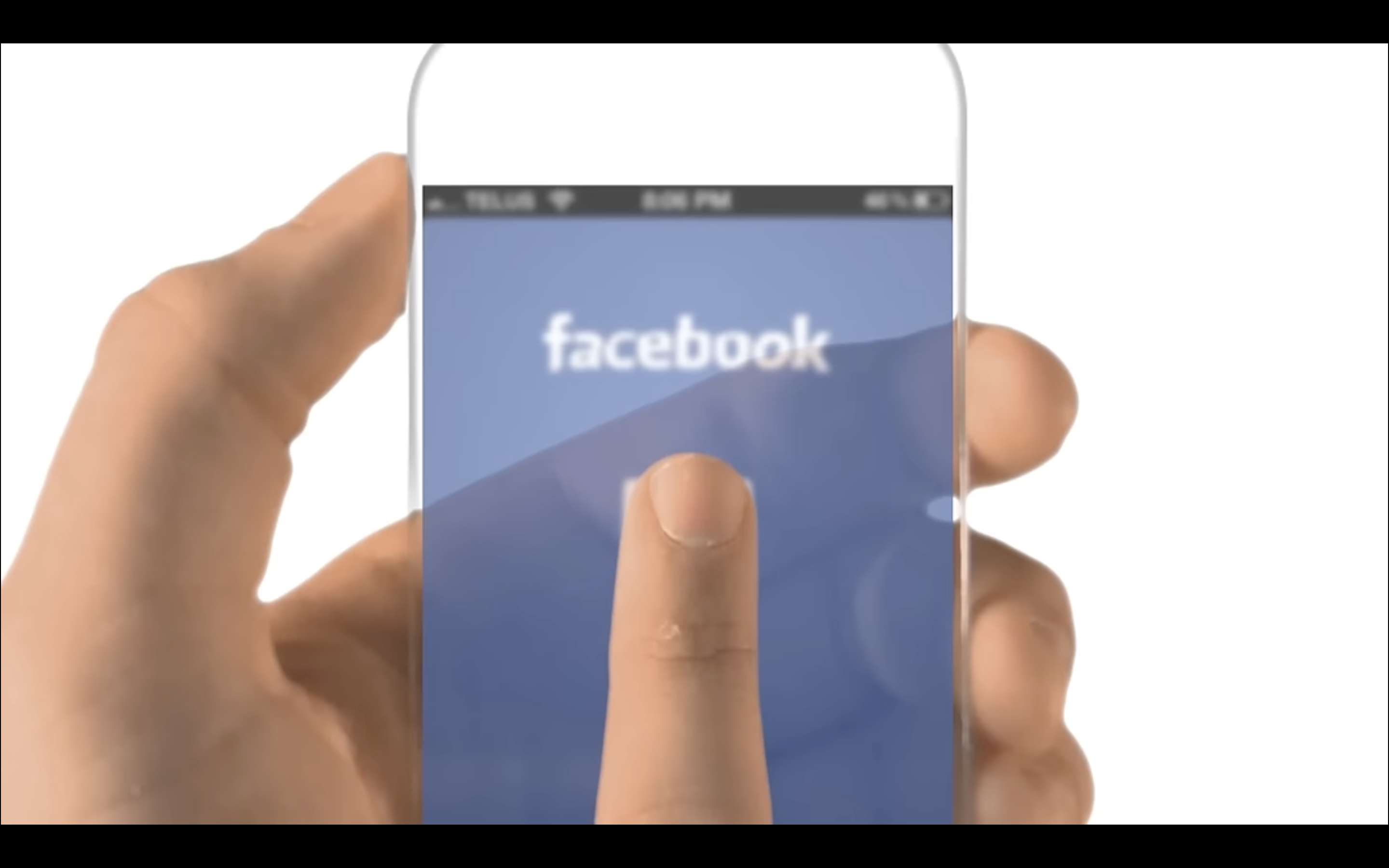 hand holding transparent smartphone facebook