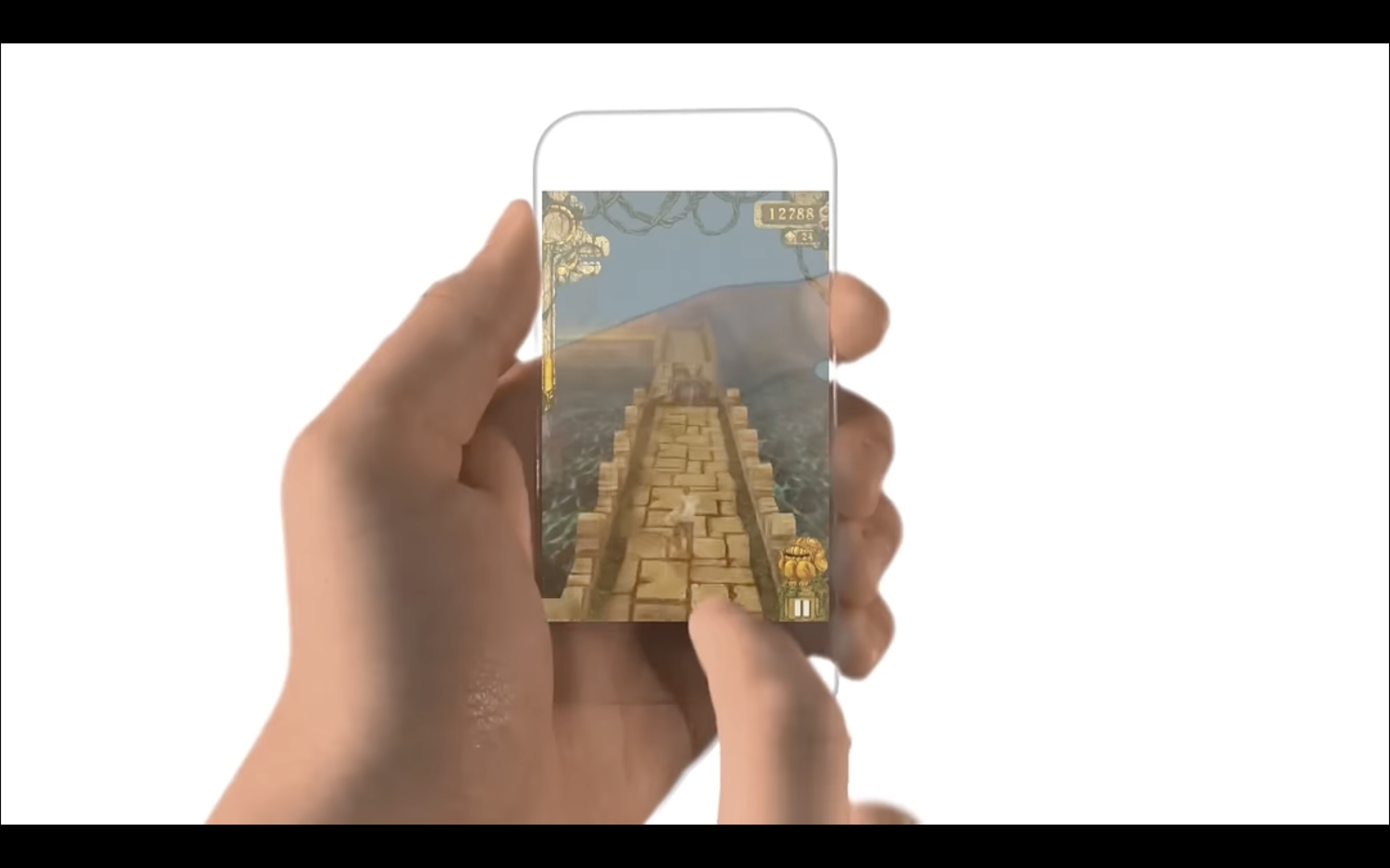 hand holding transparent smartphone game