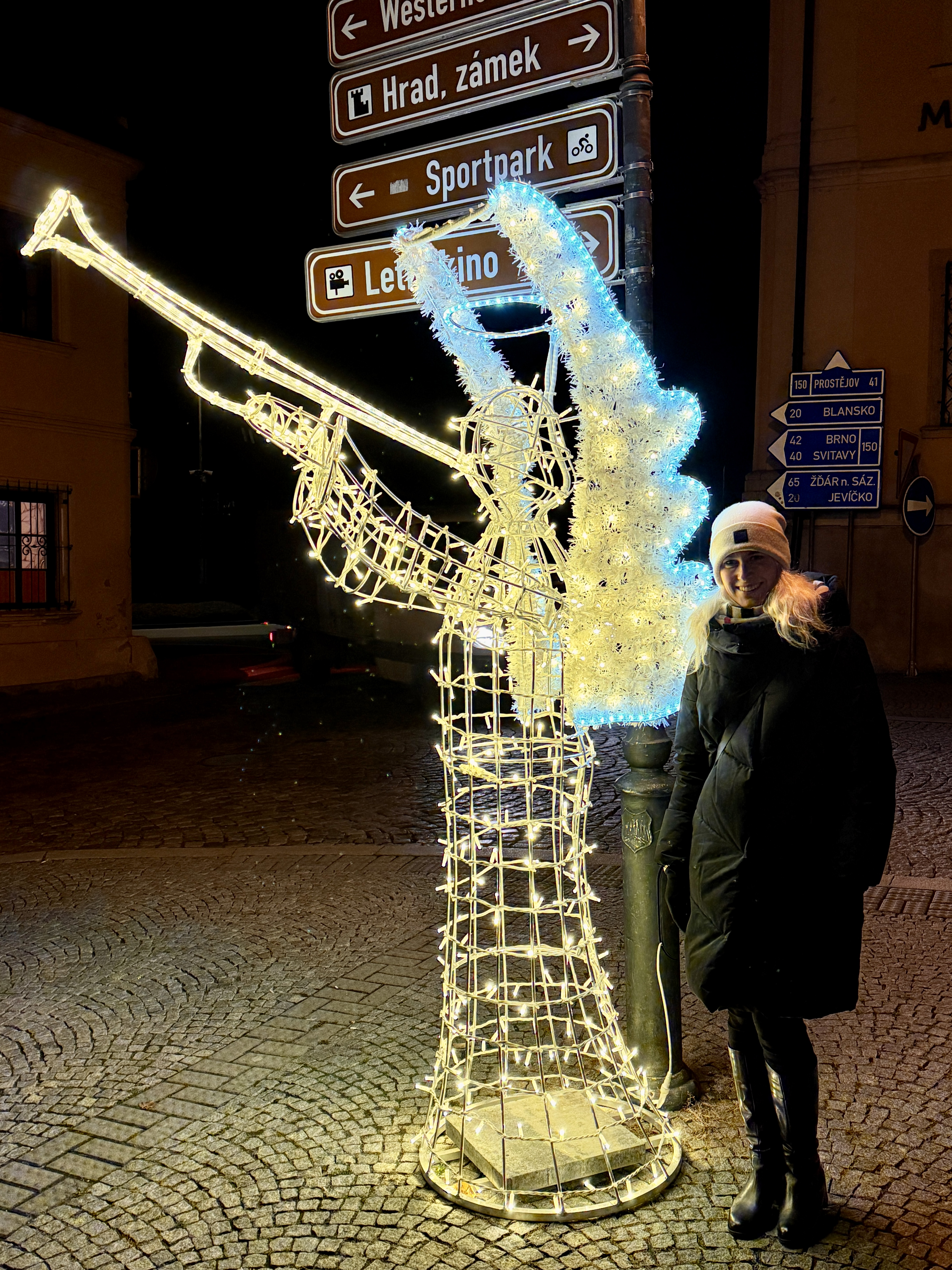 illuminated angel statue night